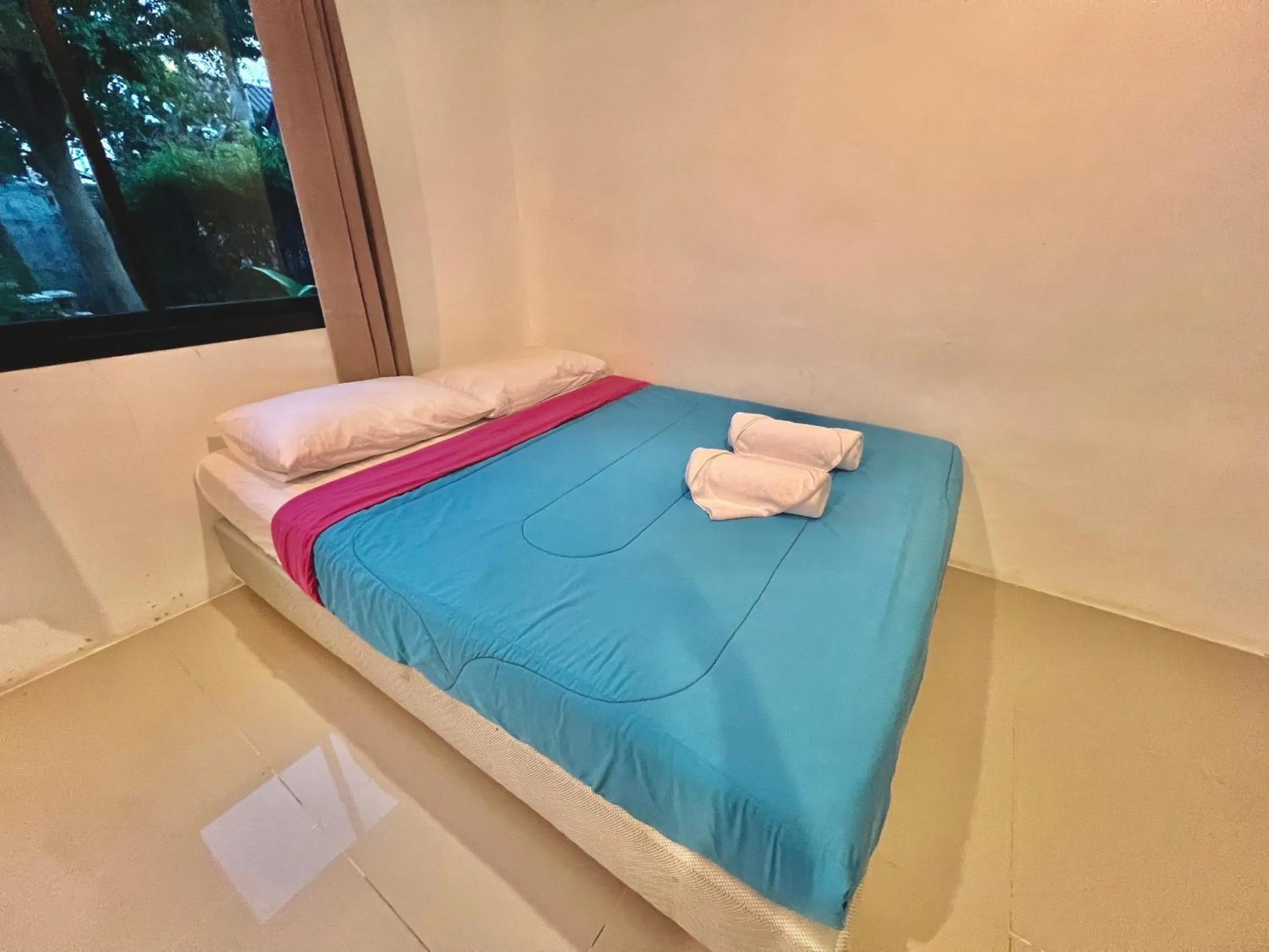 Bed in PHUPA BEACH Resort