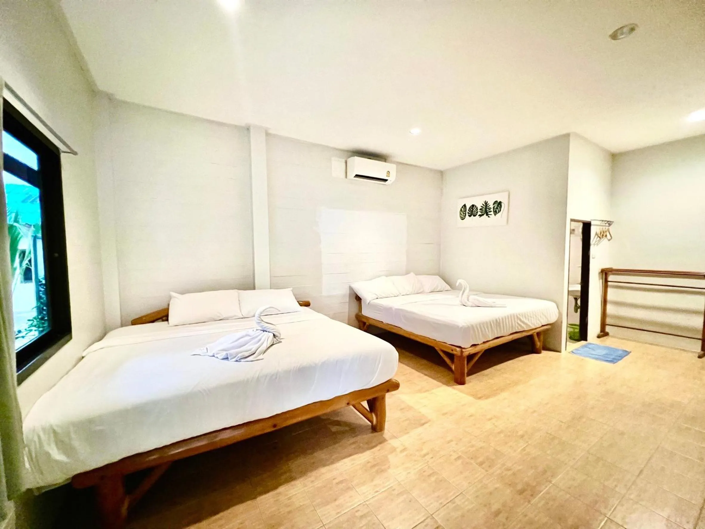 Bed in PHUPA BEACH Resort