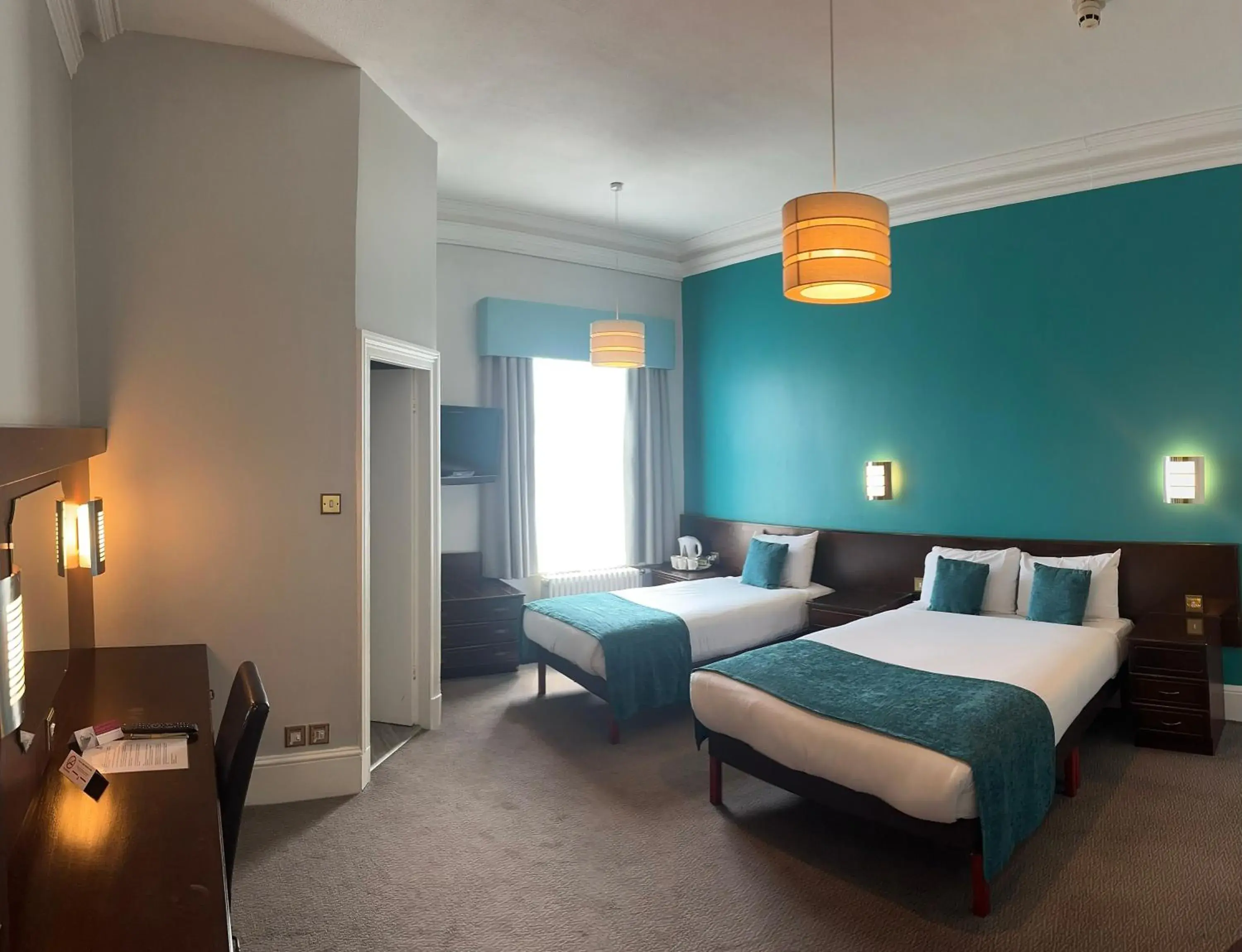 Family Room with Double and Two Single Beds in Royal Clifton Hotel Family Room with Double and Two Single Beds in Royal Clifton Hotel