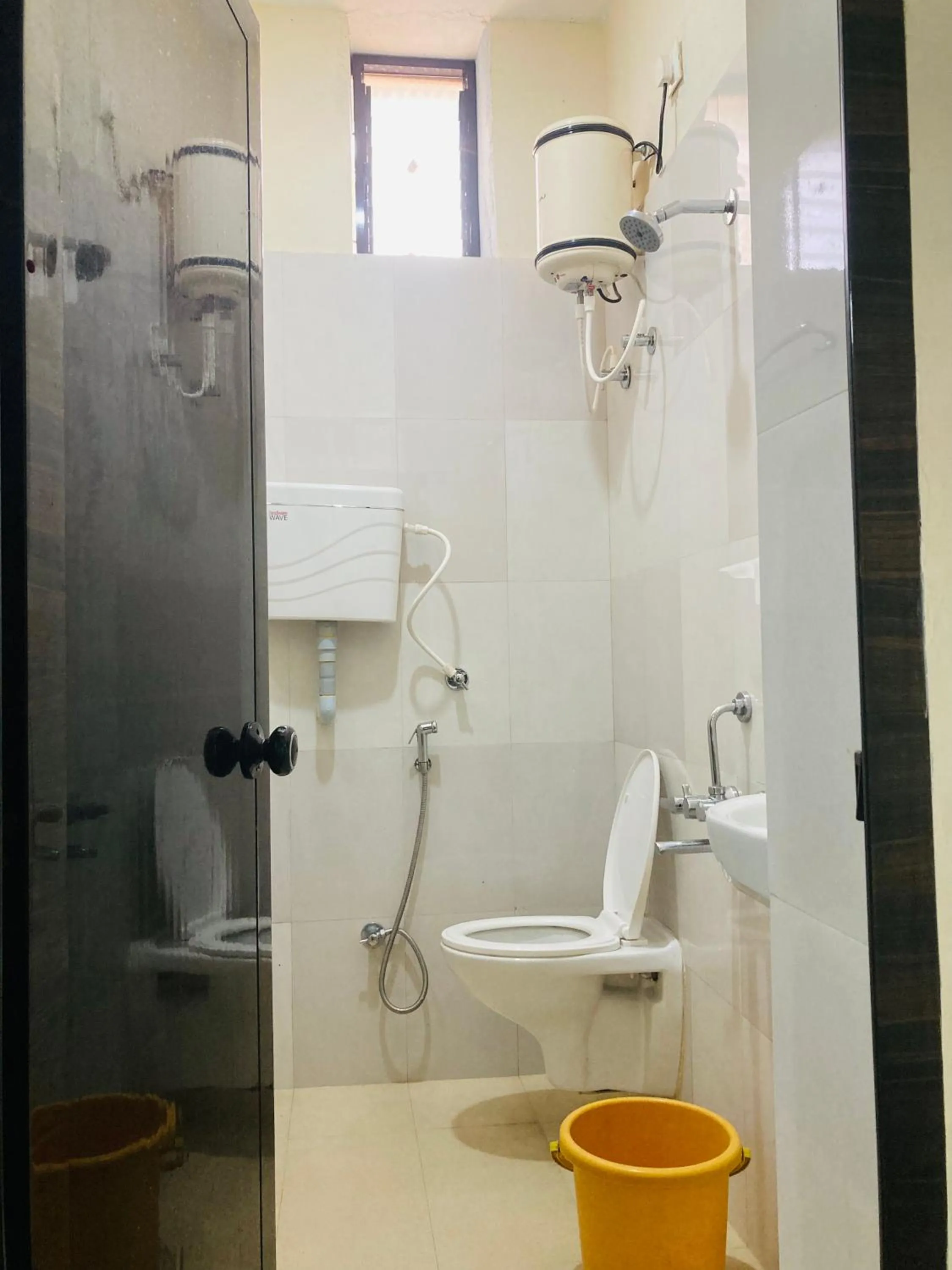 Toilet in Oceanic Stay And Restaurant Gokarna