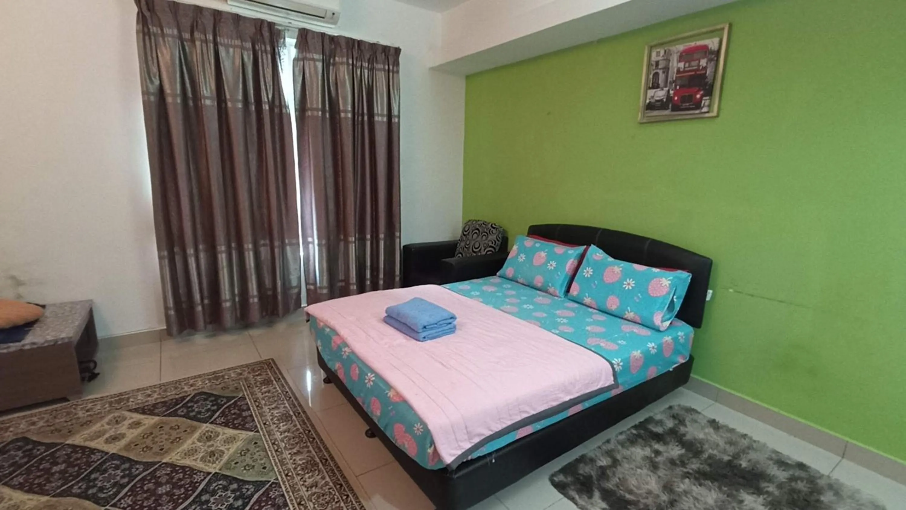 Bed in De Viana Apartments Homestay