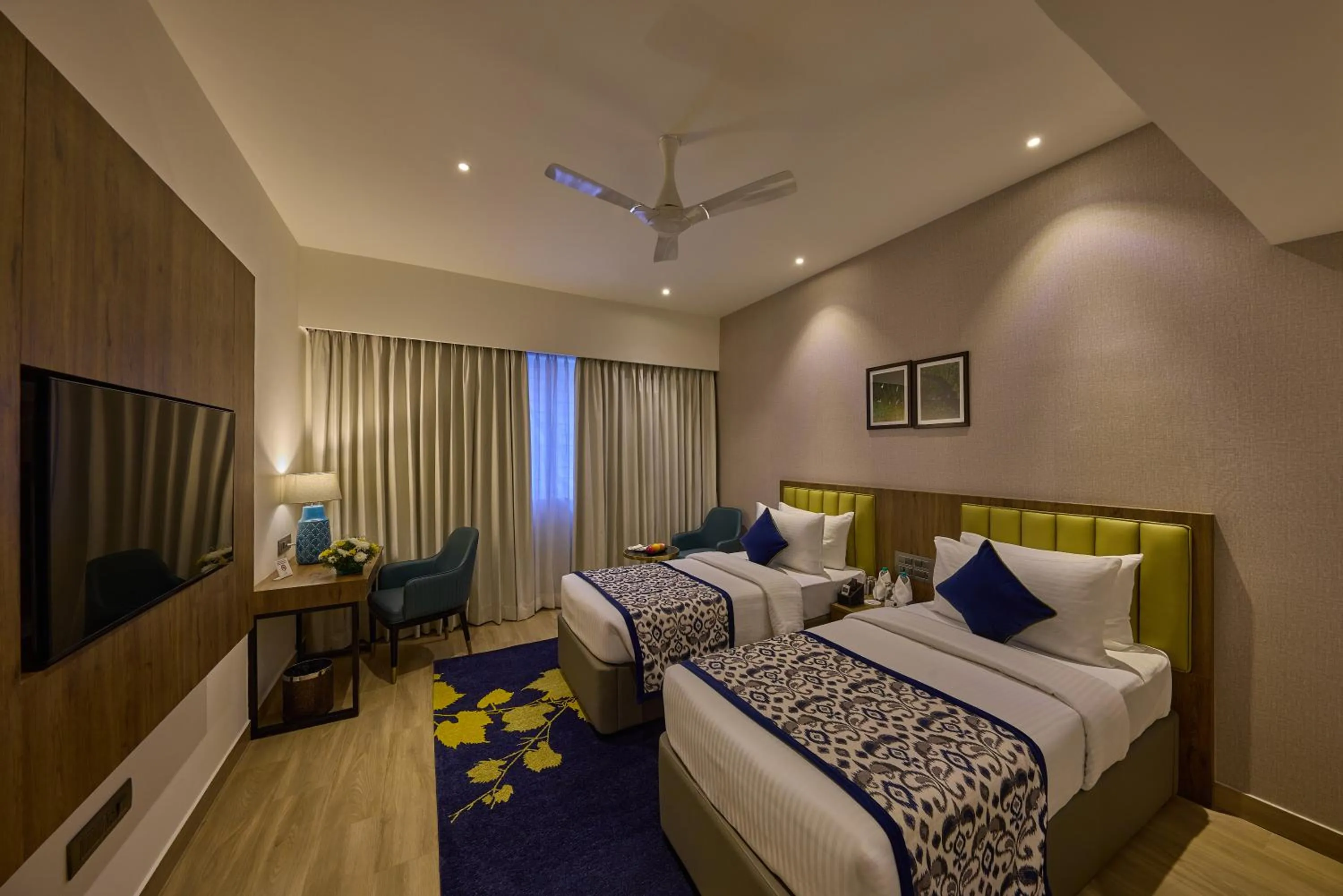 Bed in Grand Continent Hebbal A Sarovar Portico Affiliate Hotel