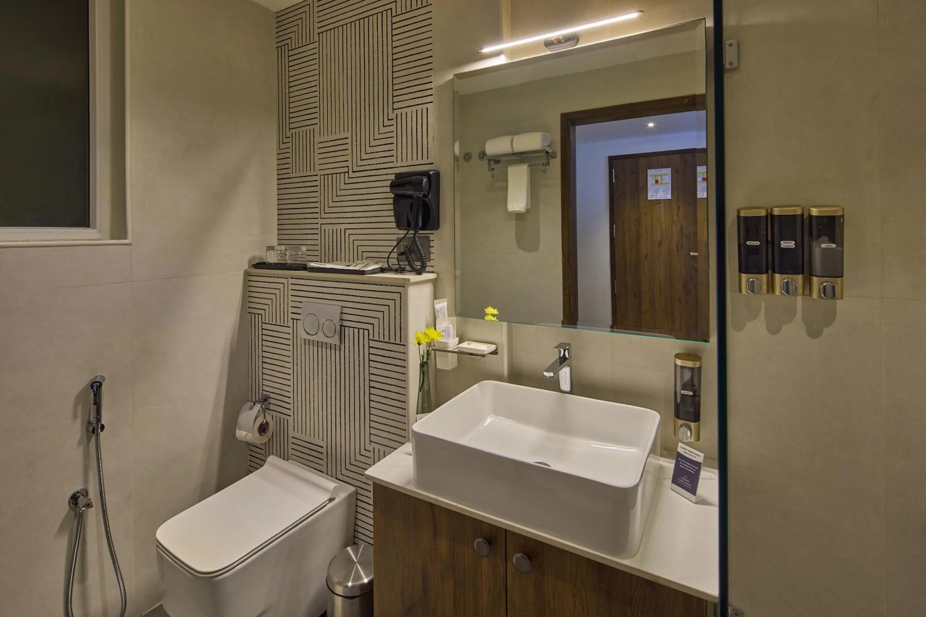 Bathroom in Grand Continent Hebbal A Sarovar Portico Affiliate Hotel