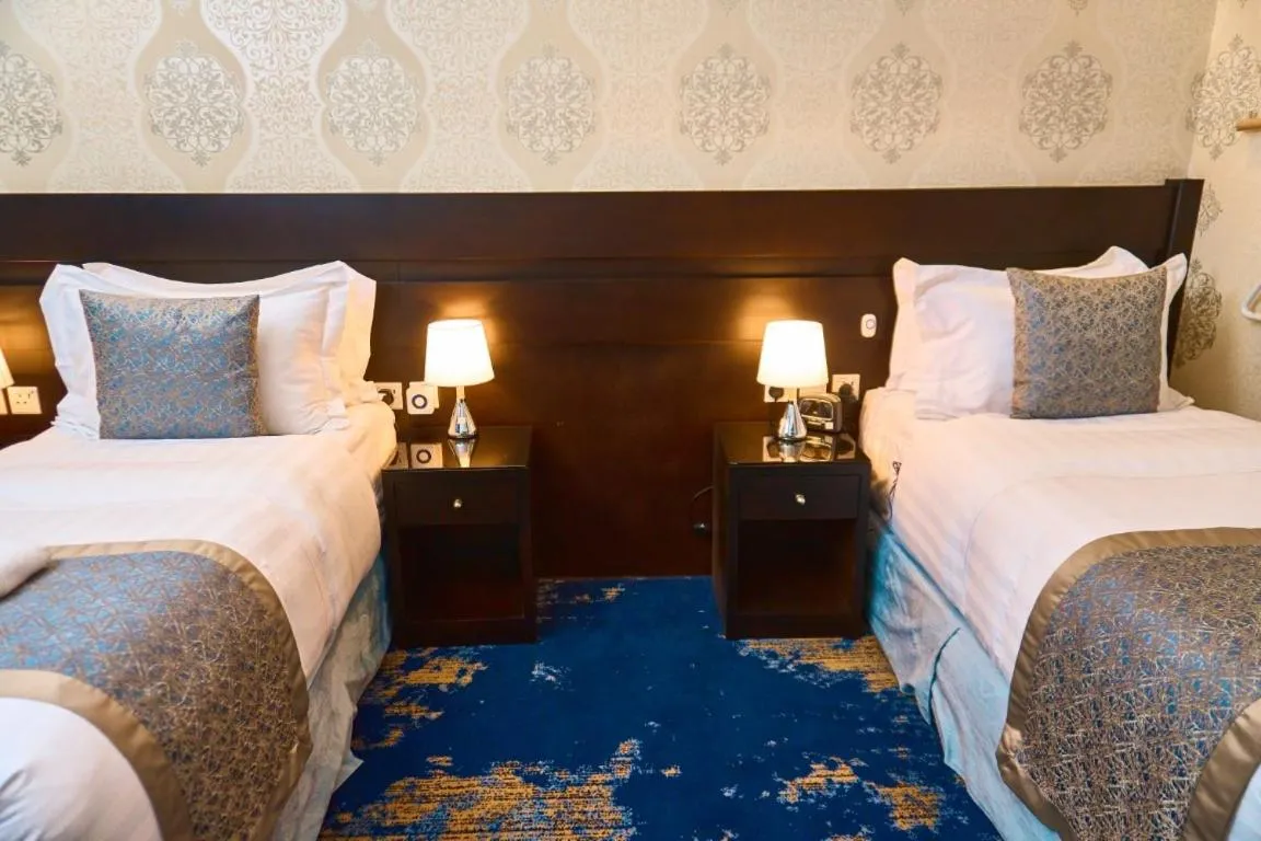 Photo of the whole room, Bed in Selat Al Bait Hotel