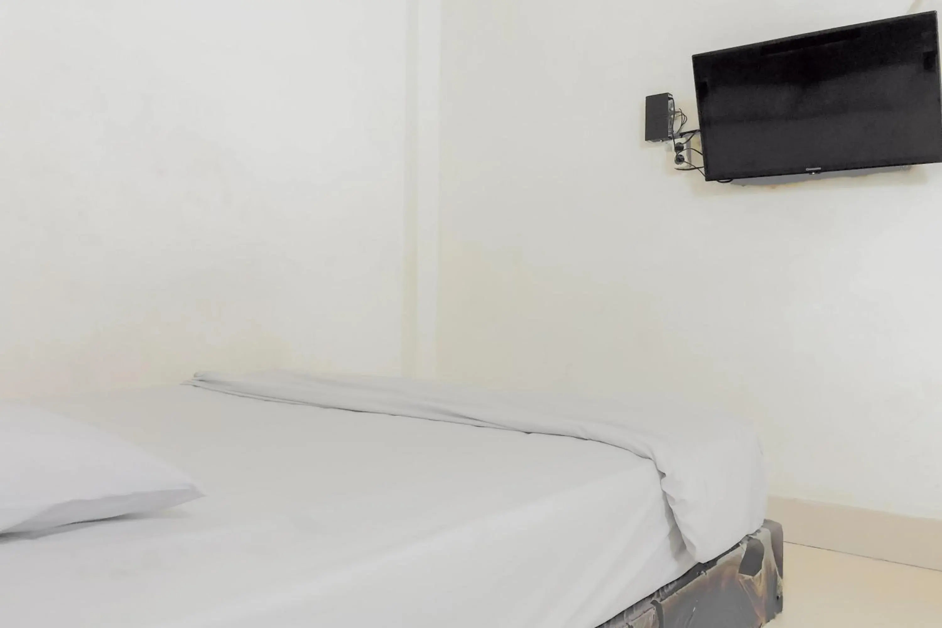 Bedroom, Bed in Hotel Mulia Tiza Binjai RedPartner Bedroom, Bed in Hotel Mulia Tiza Binjai RedPartner