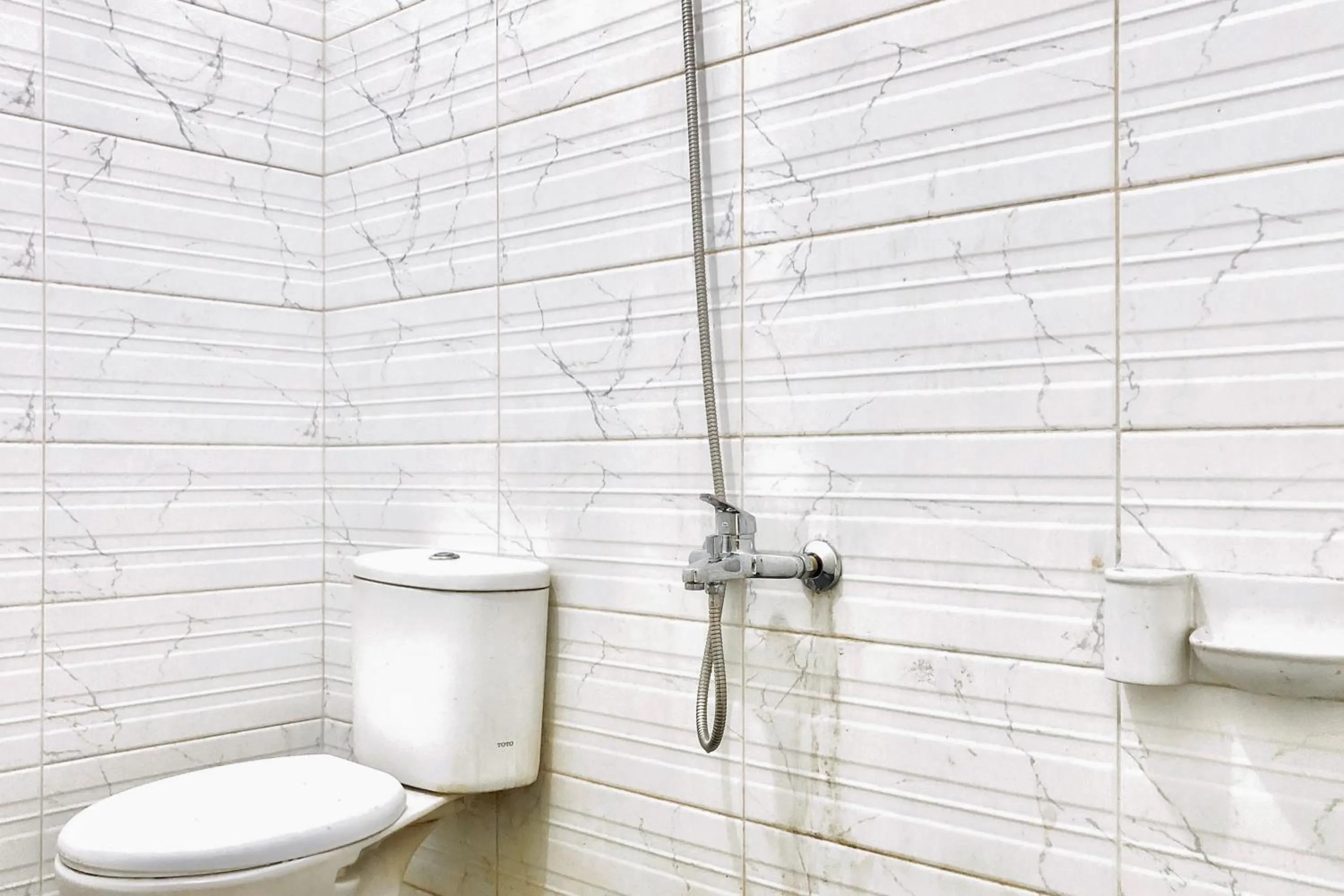 Bathroom in Hotel Mulia Tiza Binjai RedPartner