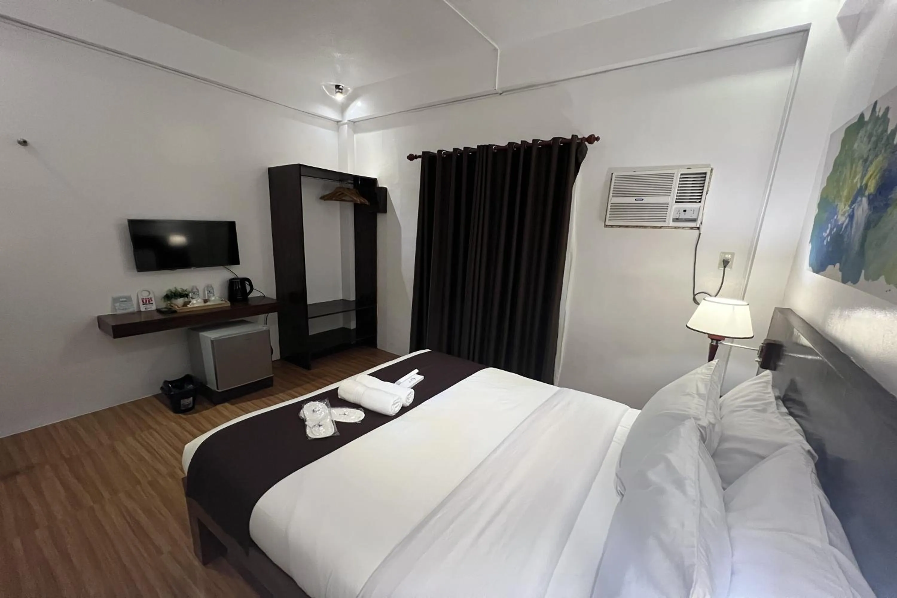 Bed in Funtasea Hotel and Beach Resort