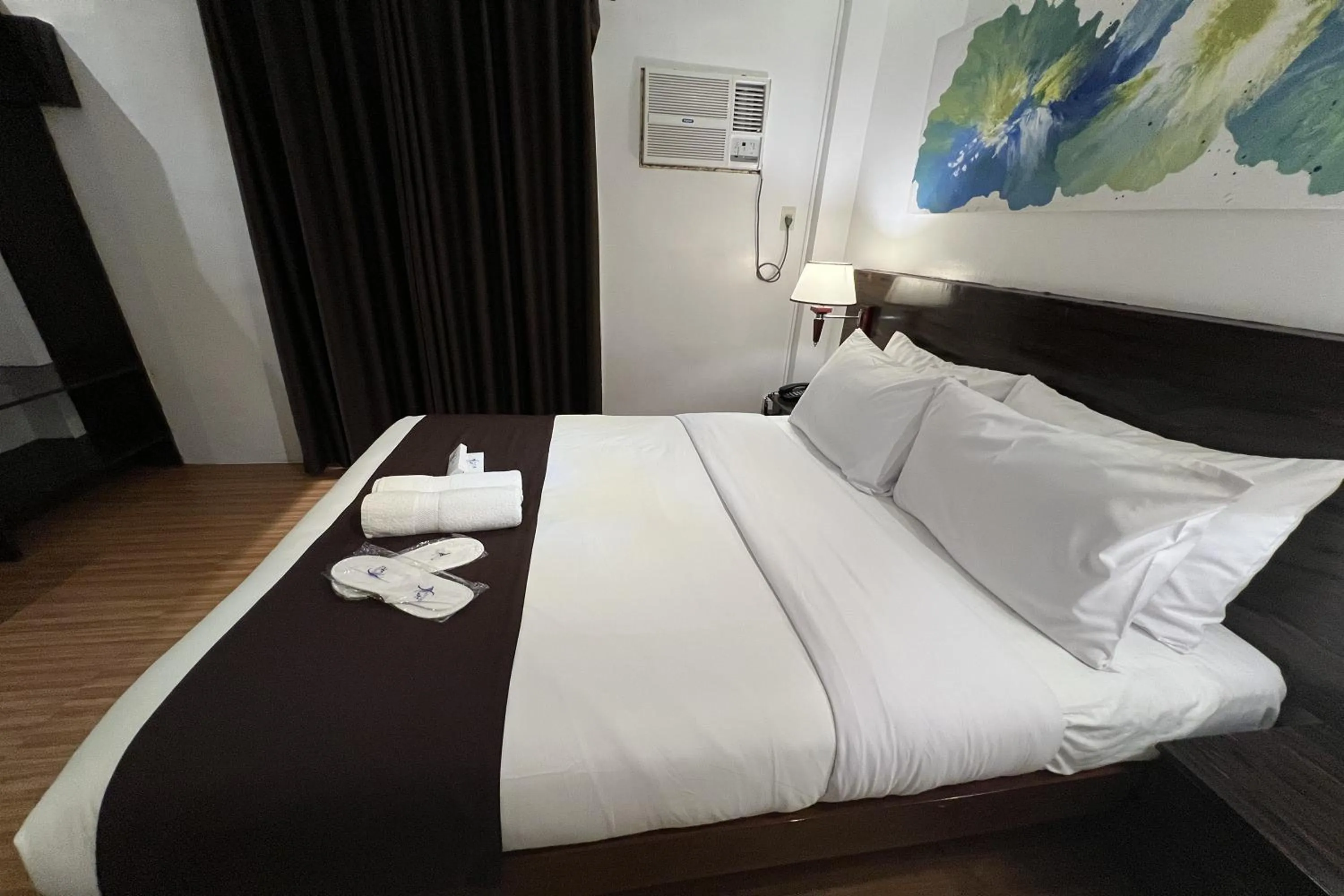 Bed in Funtasea Hotel and Beach Resort