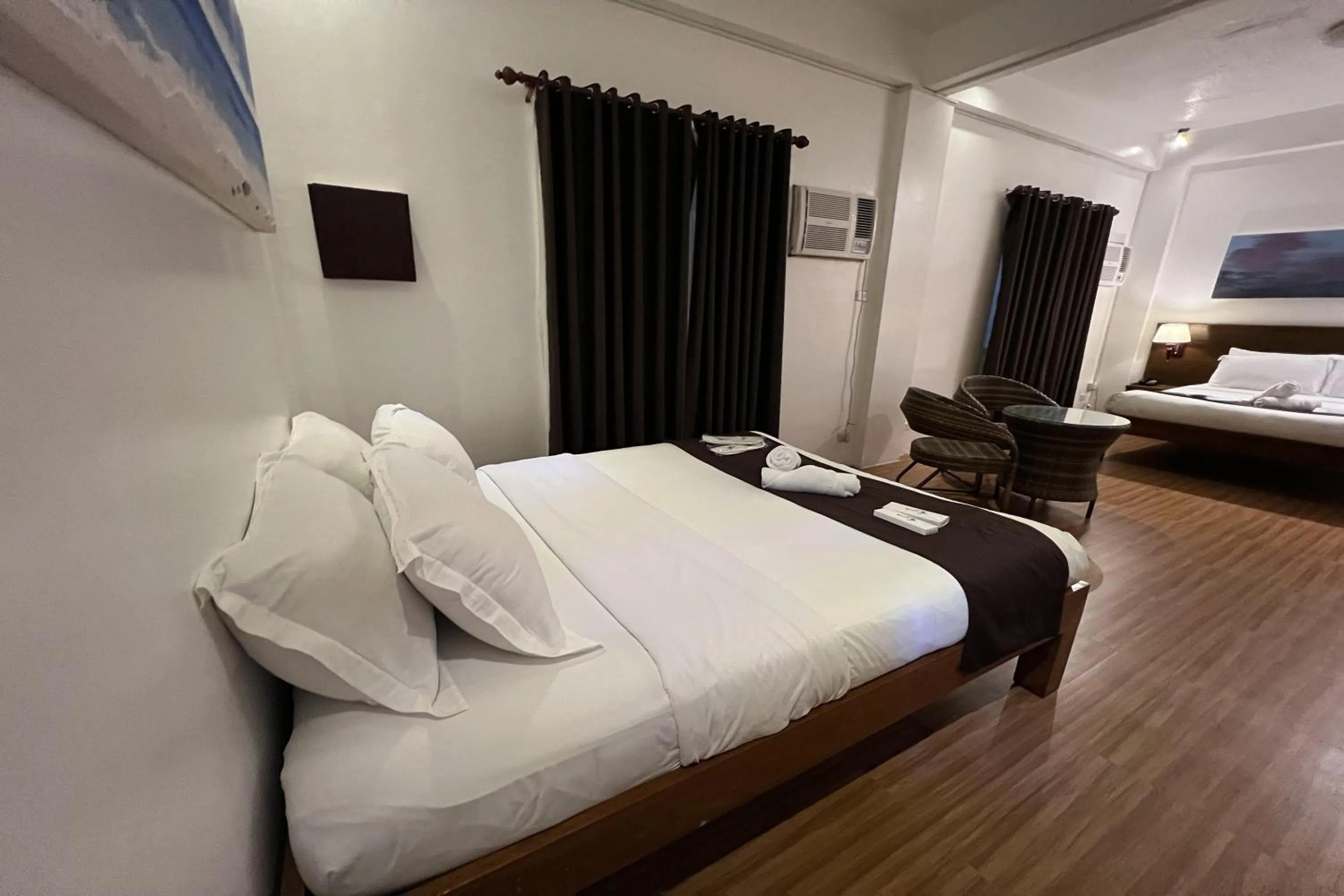 Bed in Funtasea Hotel and Beach Resort