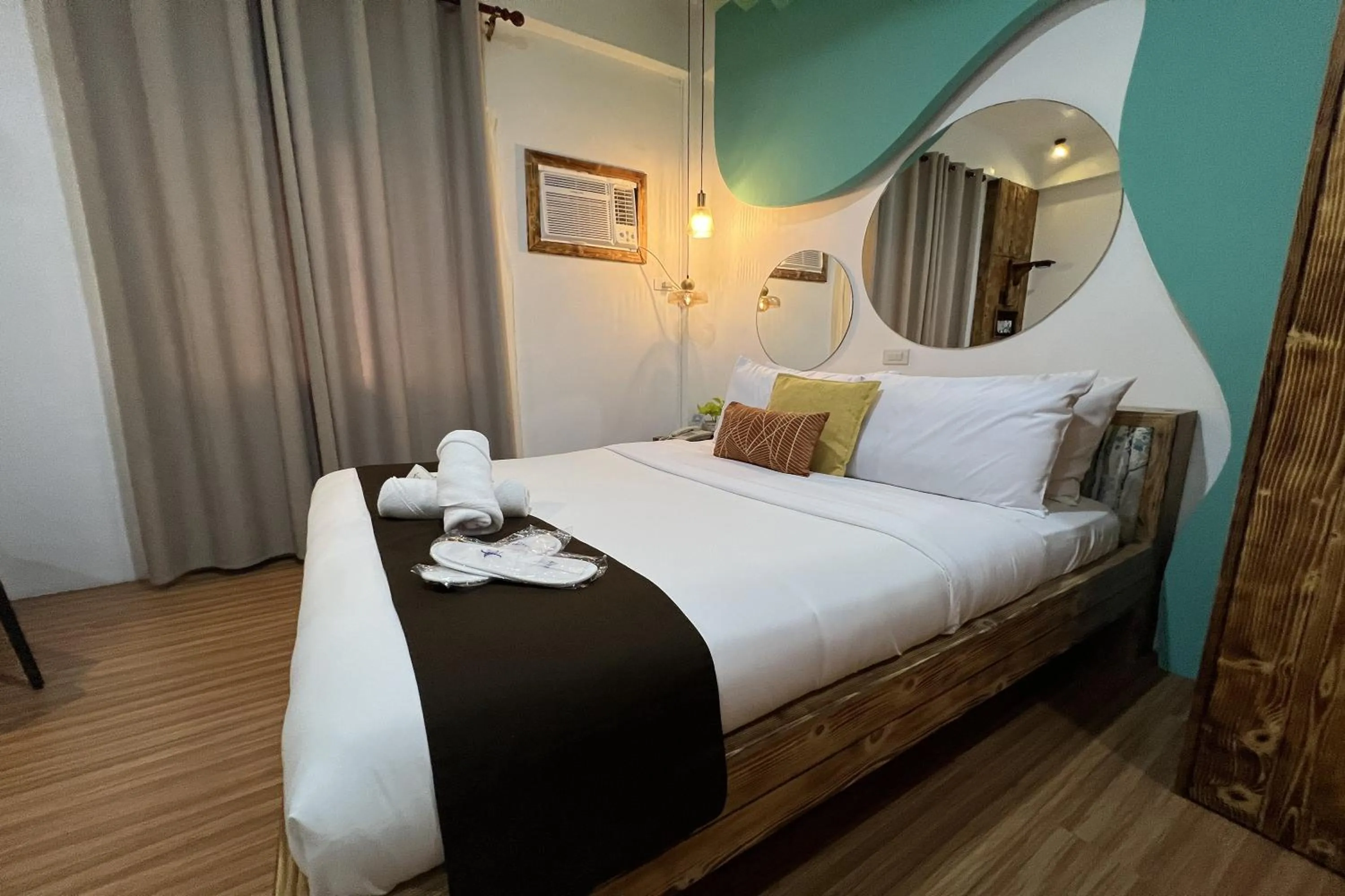 Bed in Funtasea Hotel and Beach Resort