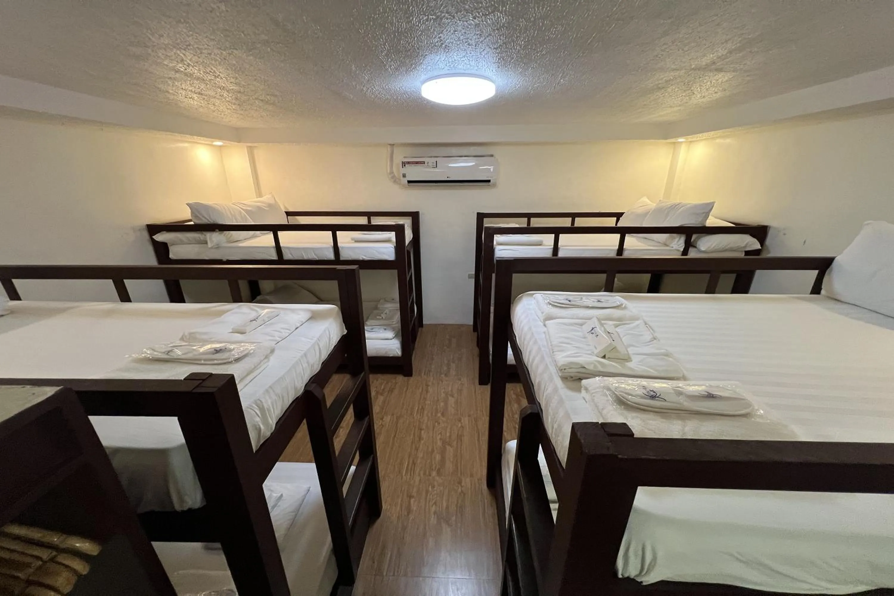 Bed in Funtasea Hotel and Beach Resort