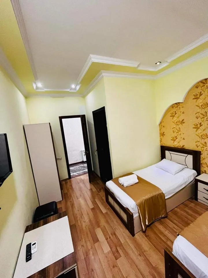 Bed in Lux Palace Hotel