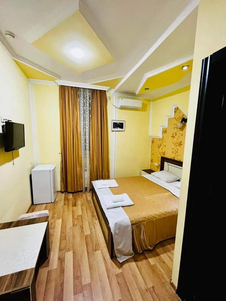 Bed in Lux Palace Hotel