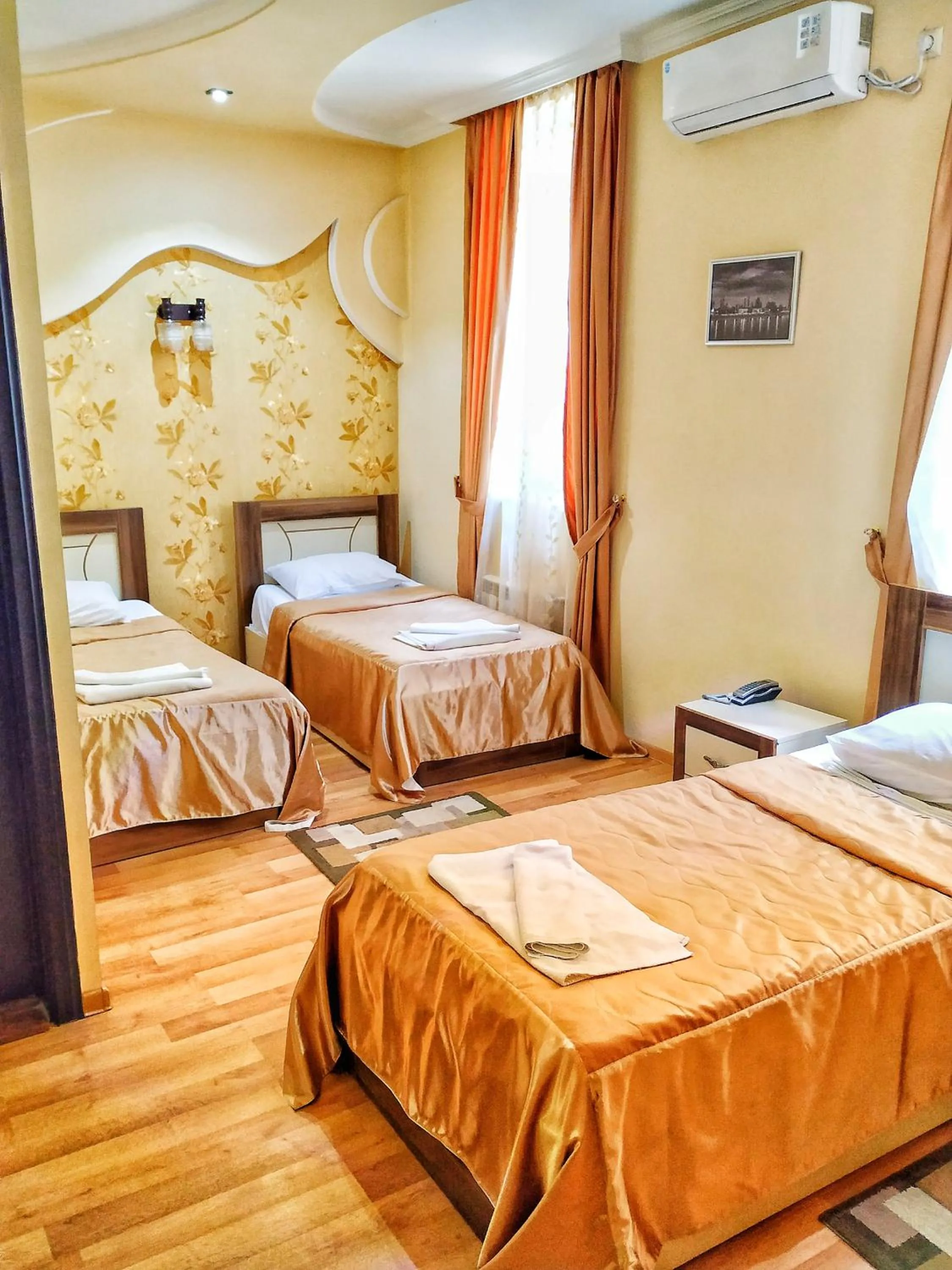 Bed in Lux Palace Hotel