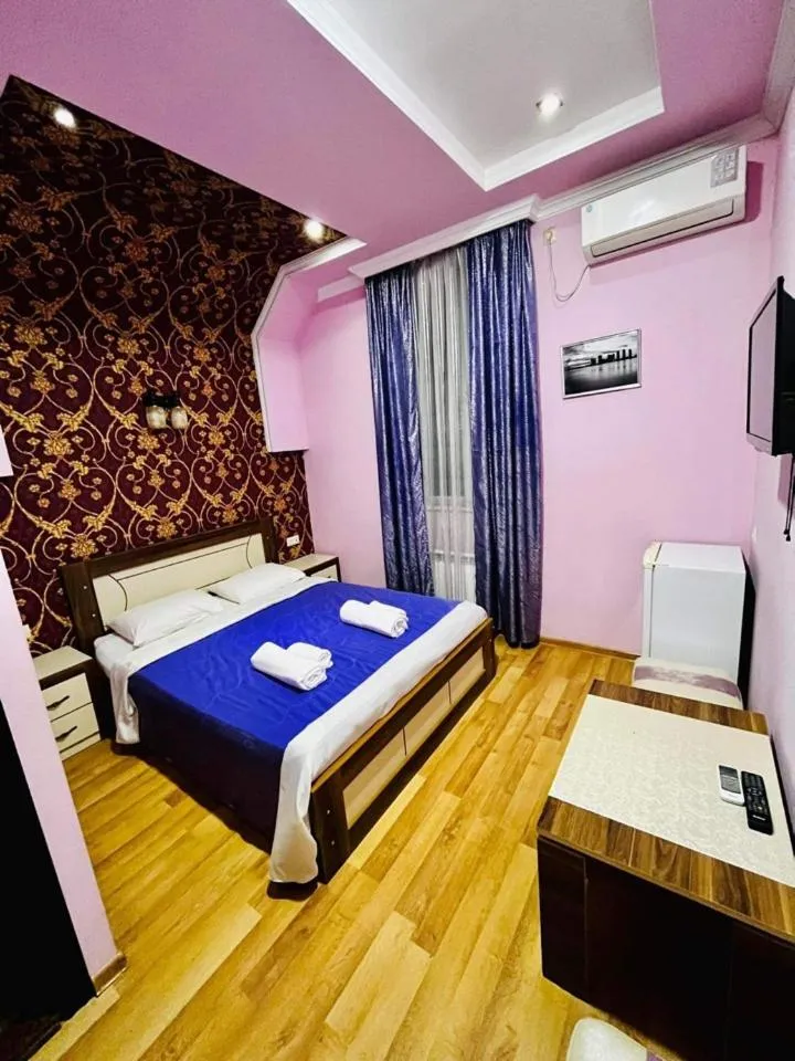 Bed in Lux Palace Hotel