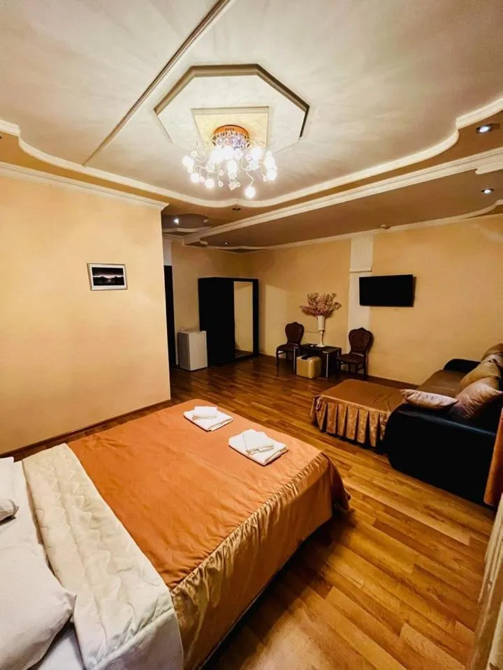 Bed in Lux Palace Hotel