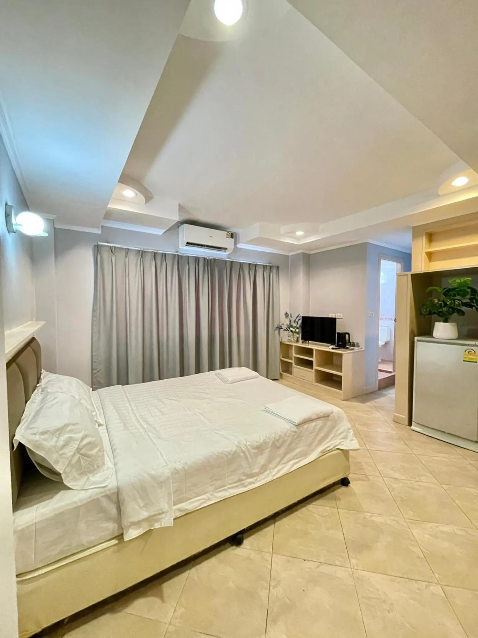 Bed in Nona Pattaya Hotel
