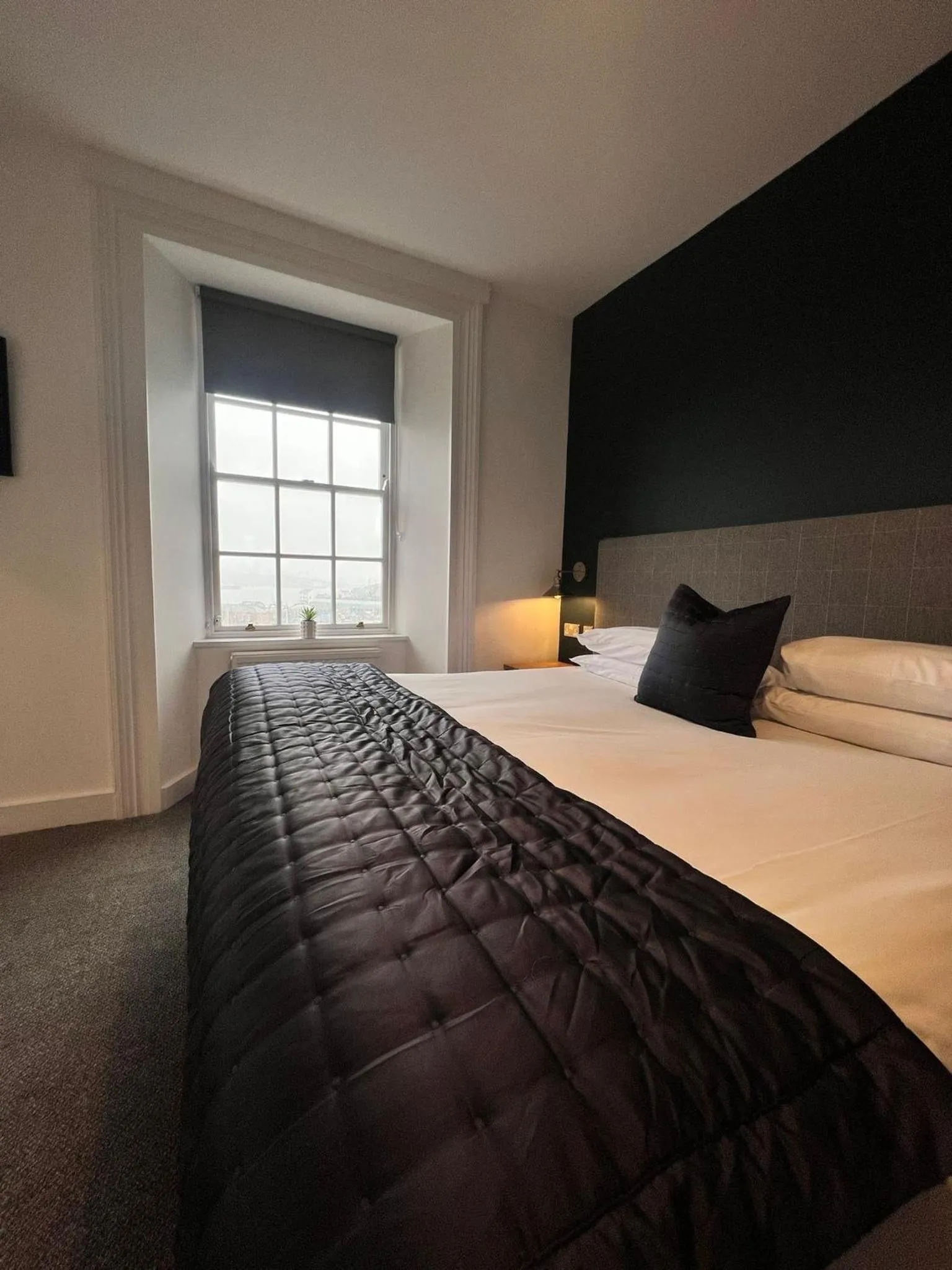 Bed in THE LORD NELSON HOTEL