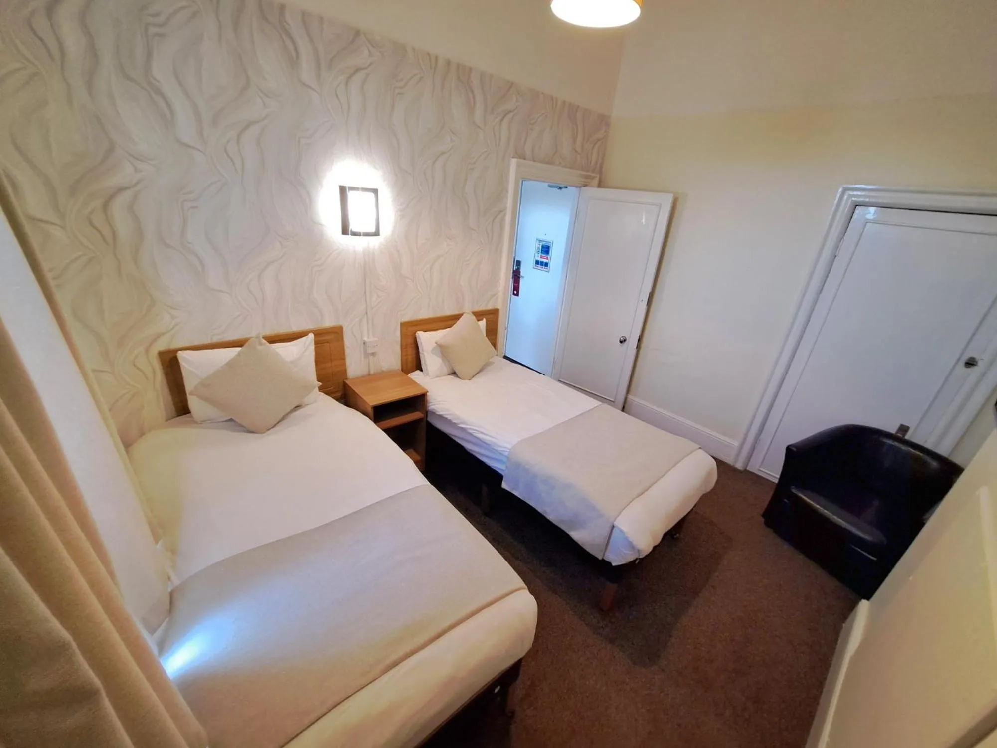 Bed in Prince Of Wales Hotel