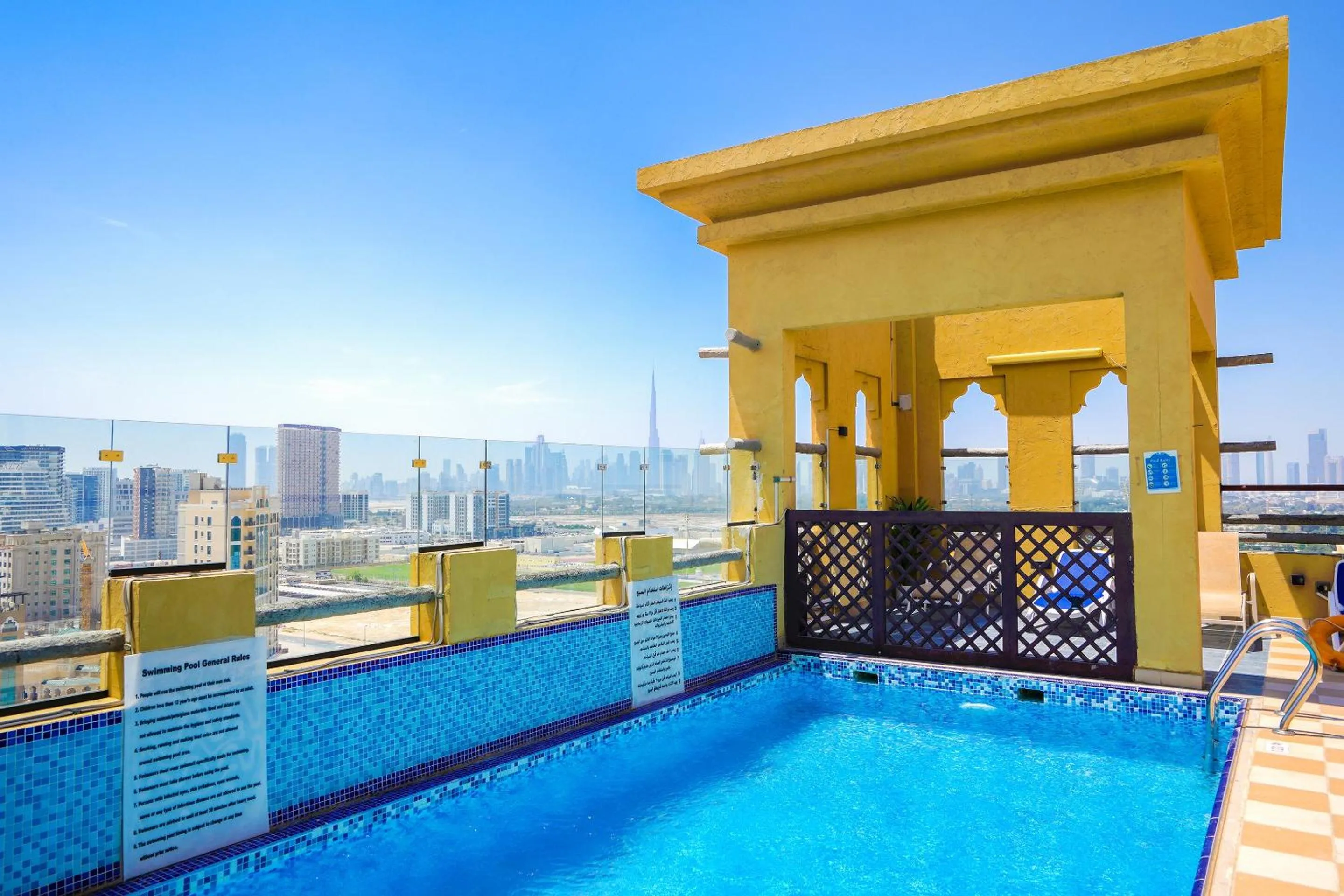 Swimming pool in Palette Royal Reflections Hotel and Spa Dubai