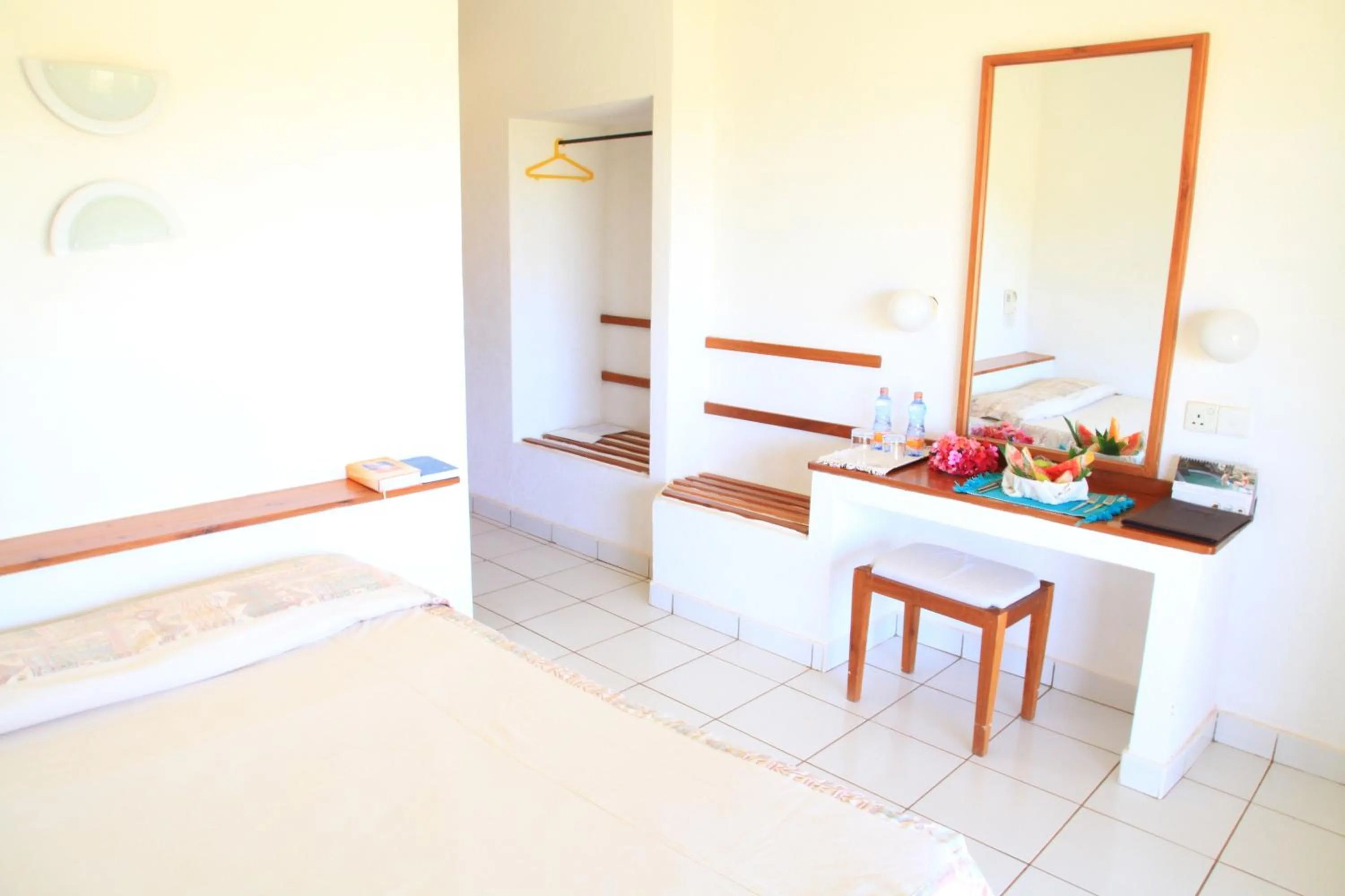 Bedroom, Dining Area in Voi Wildlife Lodge