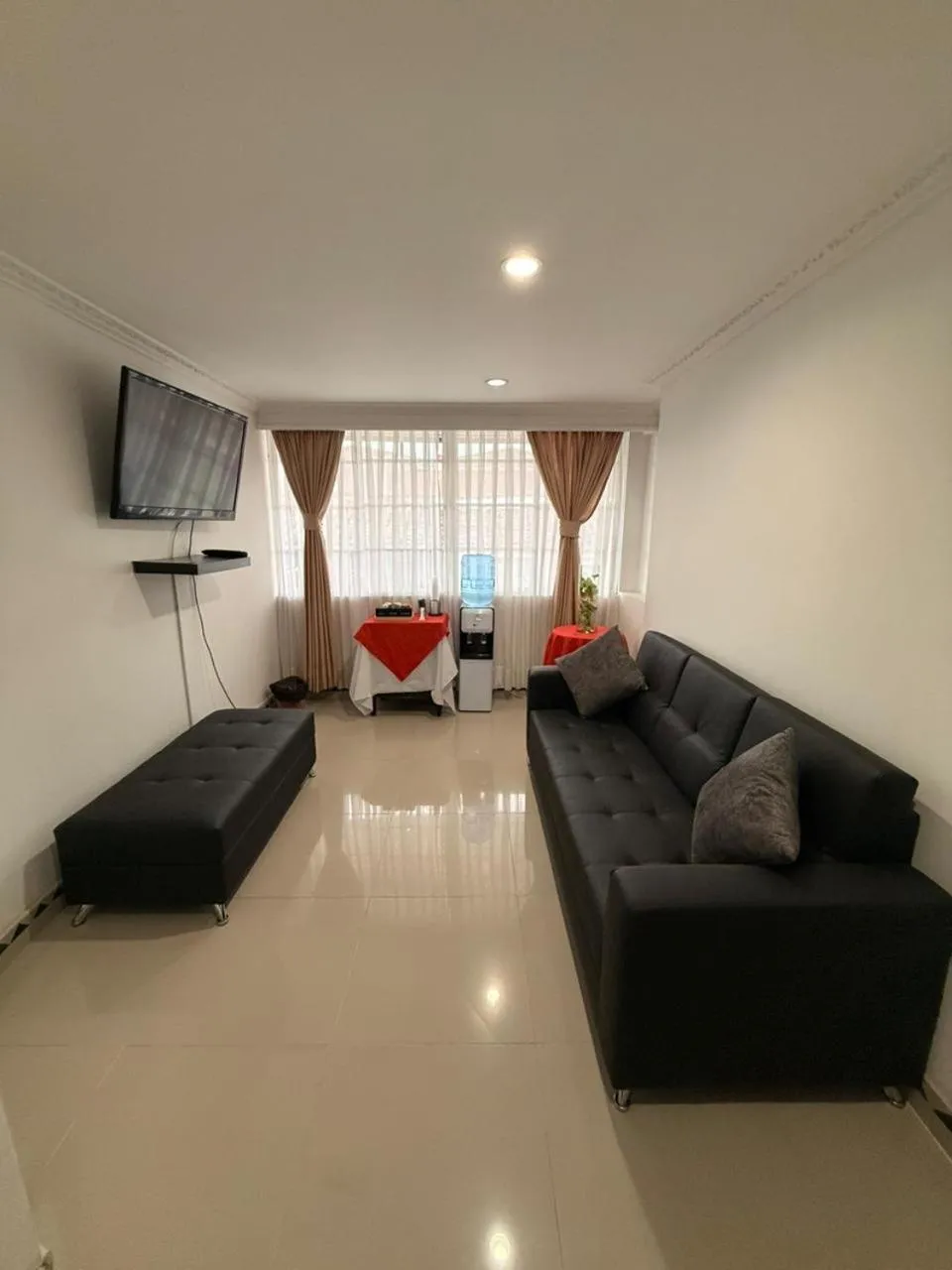 Communal lounge/ TV room in Hotel Sangil Tuluá