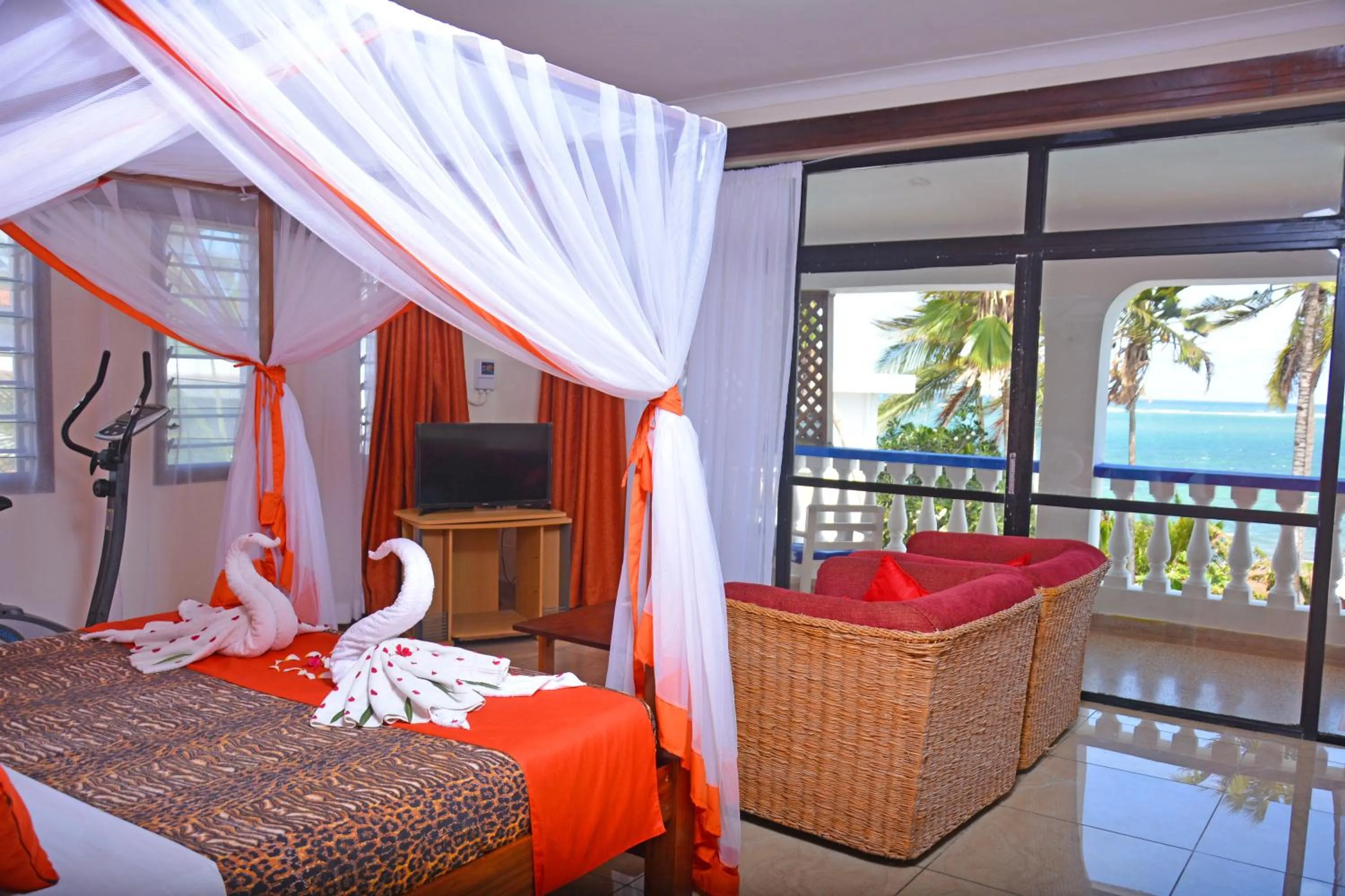 Communal lounge/ TV room, Bed in Ocean View Nyali Boutique Hotel
