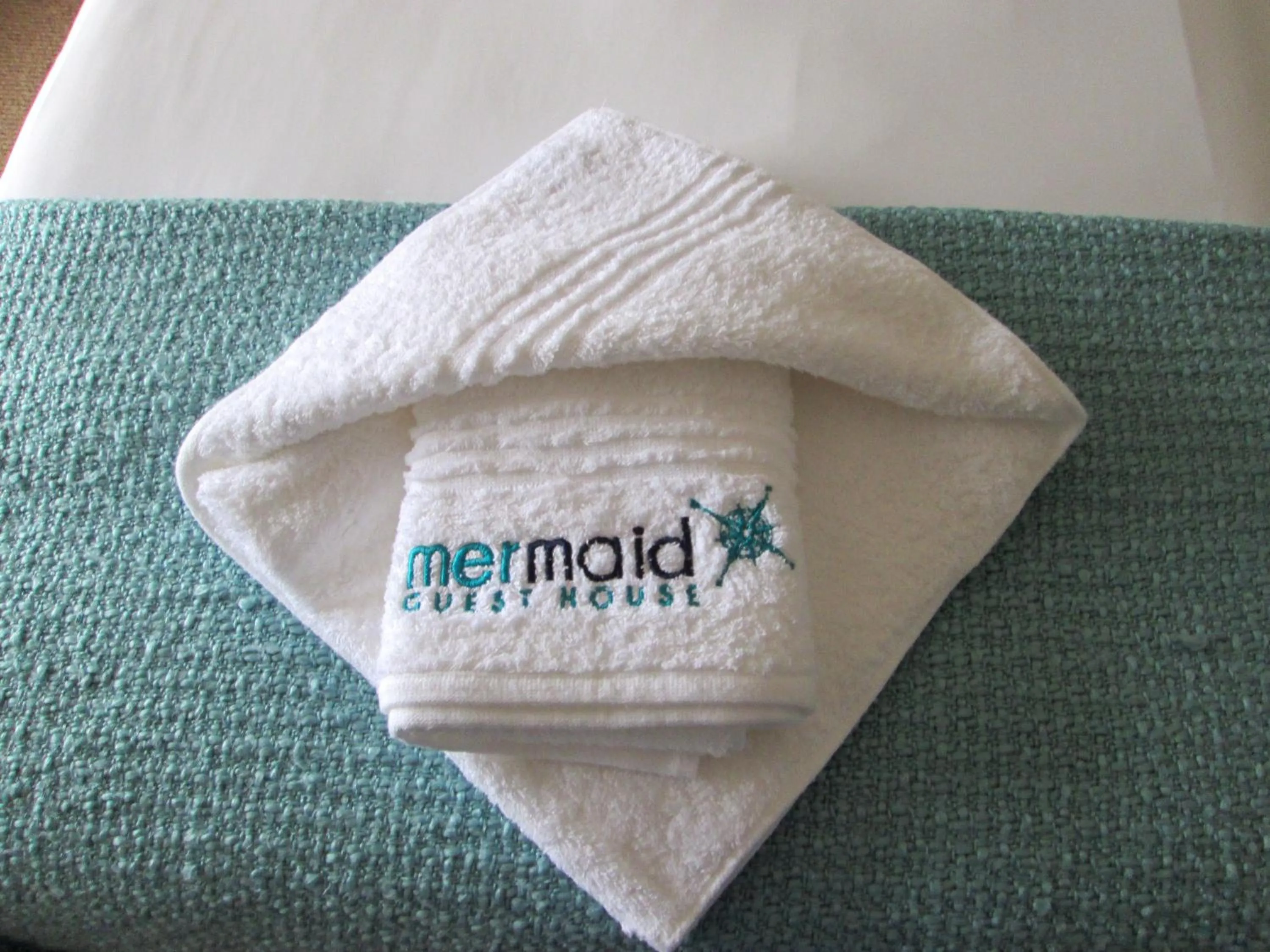 Property logo or sign in Mermaid Guest House