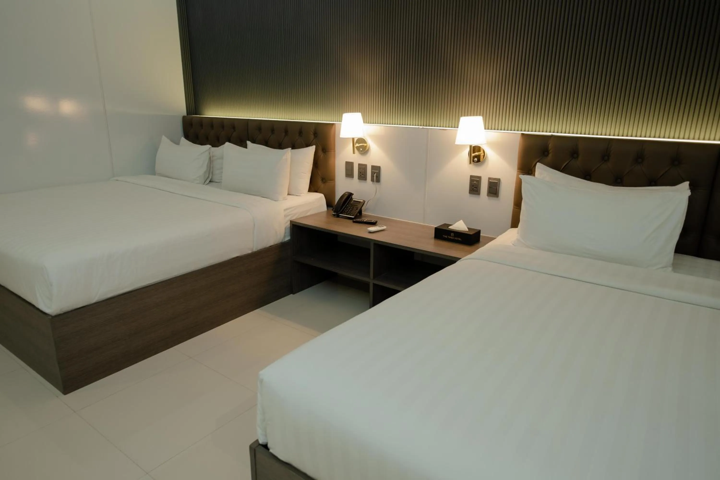 Bed in THE TIMES HOTEL