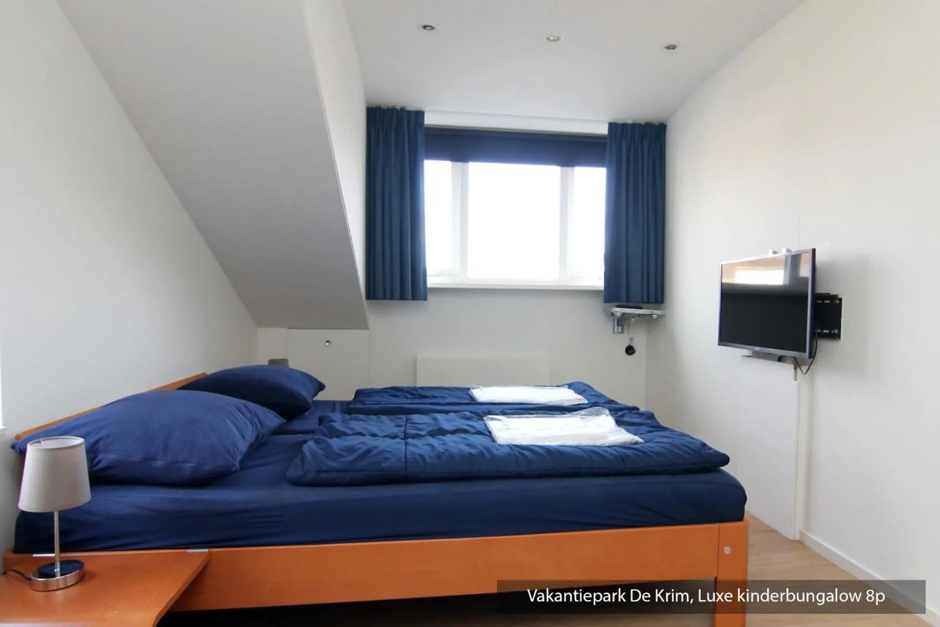 Bedroom, Bed in Vakantiepark De Krim Texel