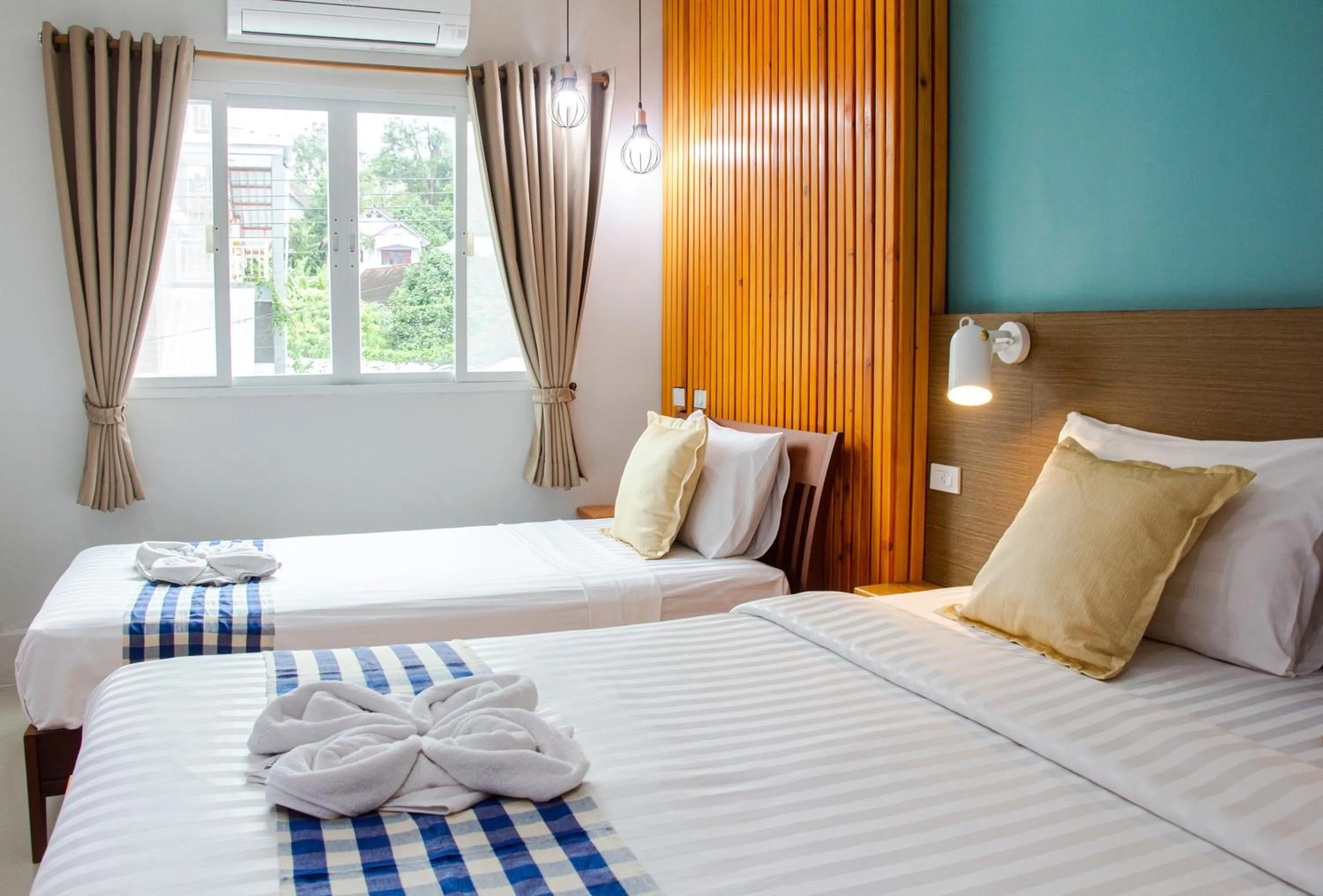 Bed in Kamala Beach Residence