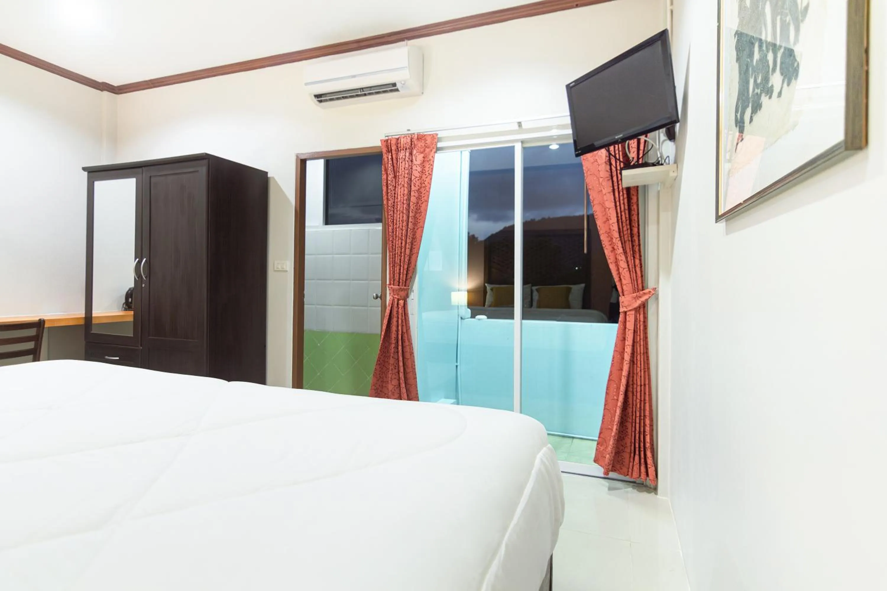 Bed in Kamala Beach Residence