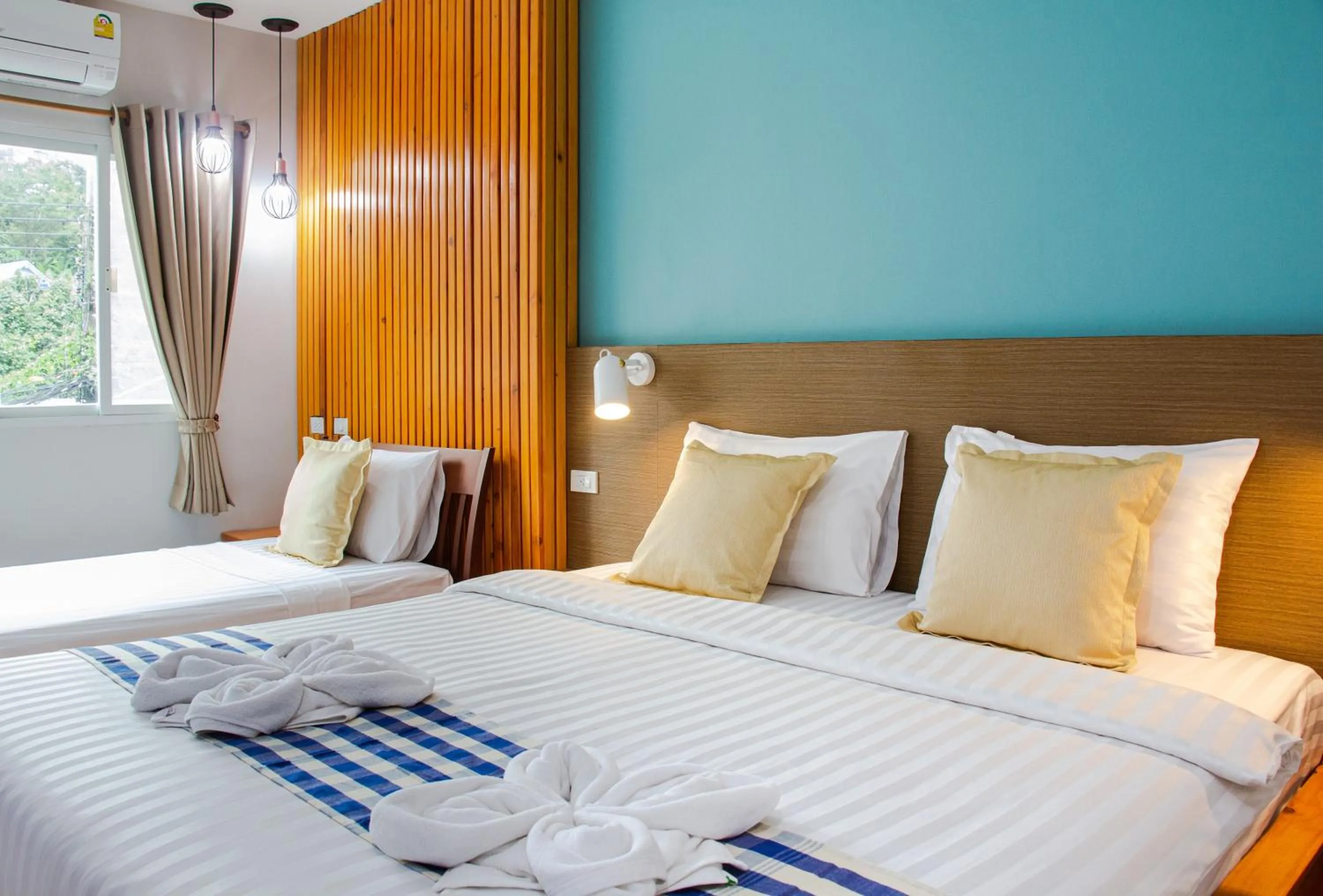 Bed in Kamala Beach Residence