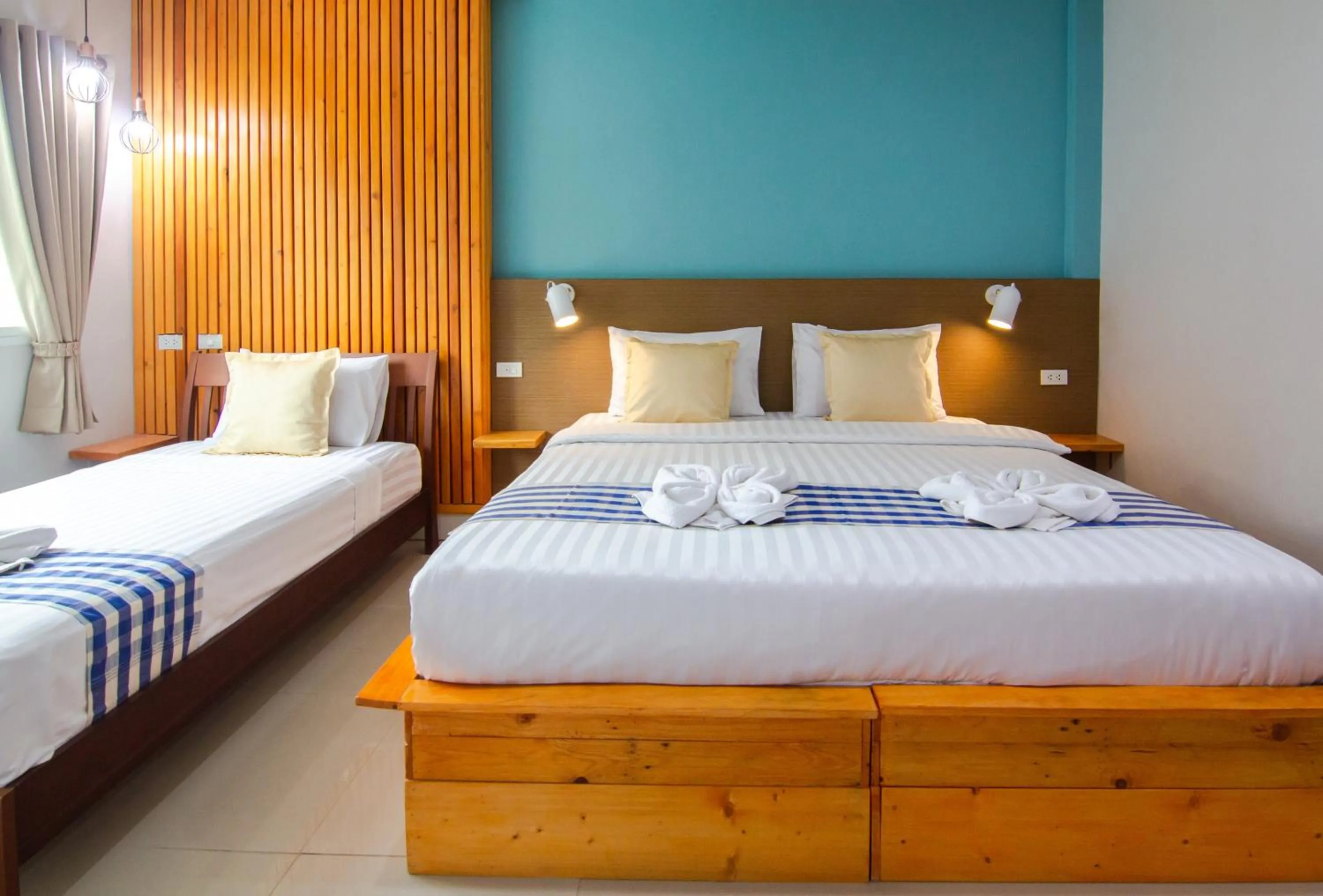 Bed in Kamala Beach Residence