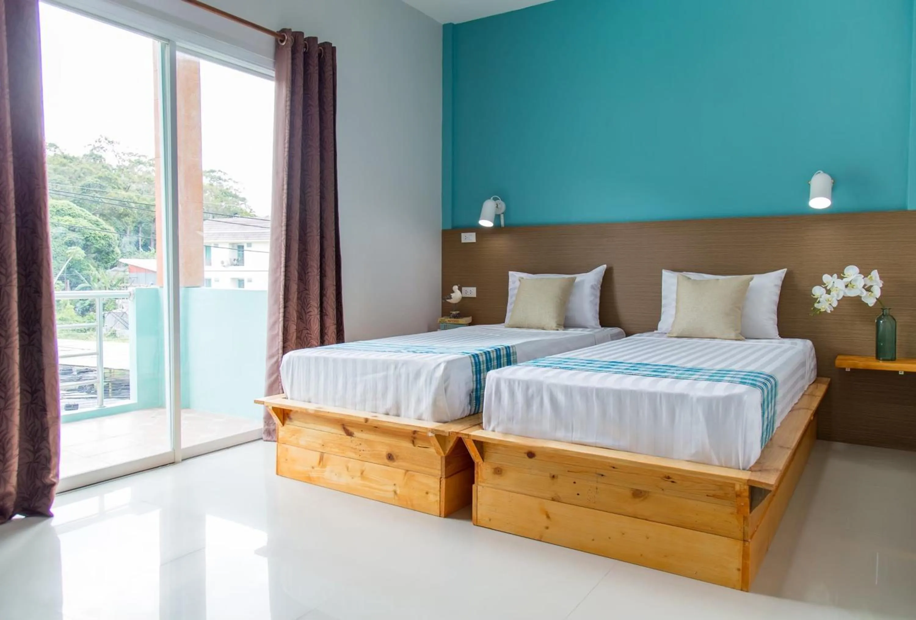 Bed in Kamala Beach Residence