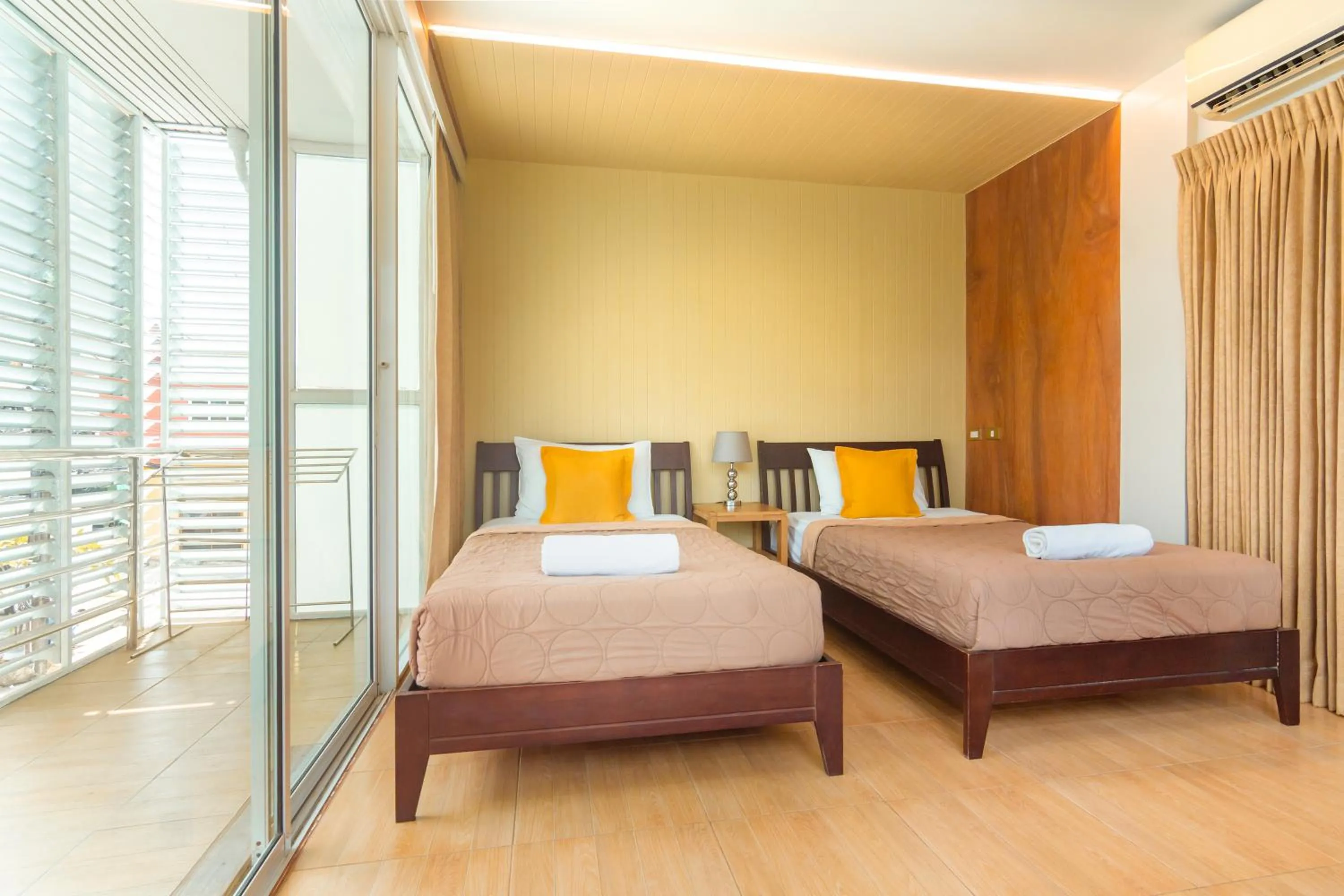 Bed in Kamala Beach Residence