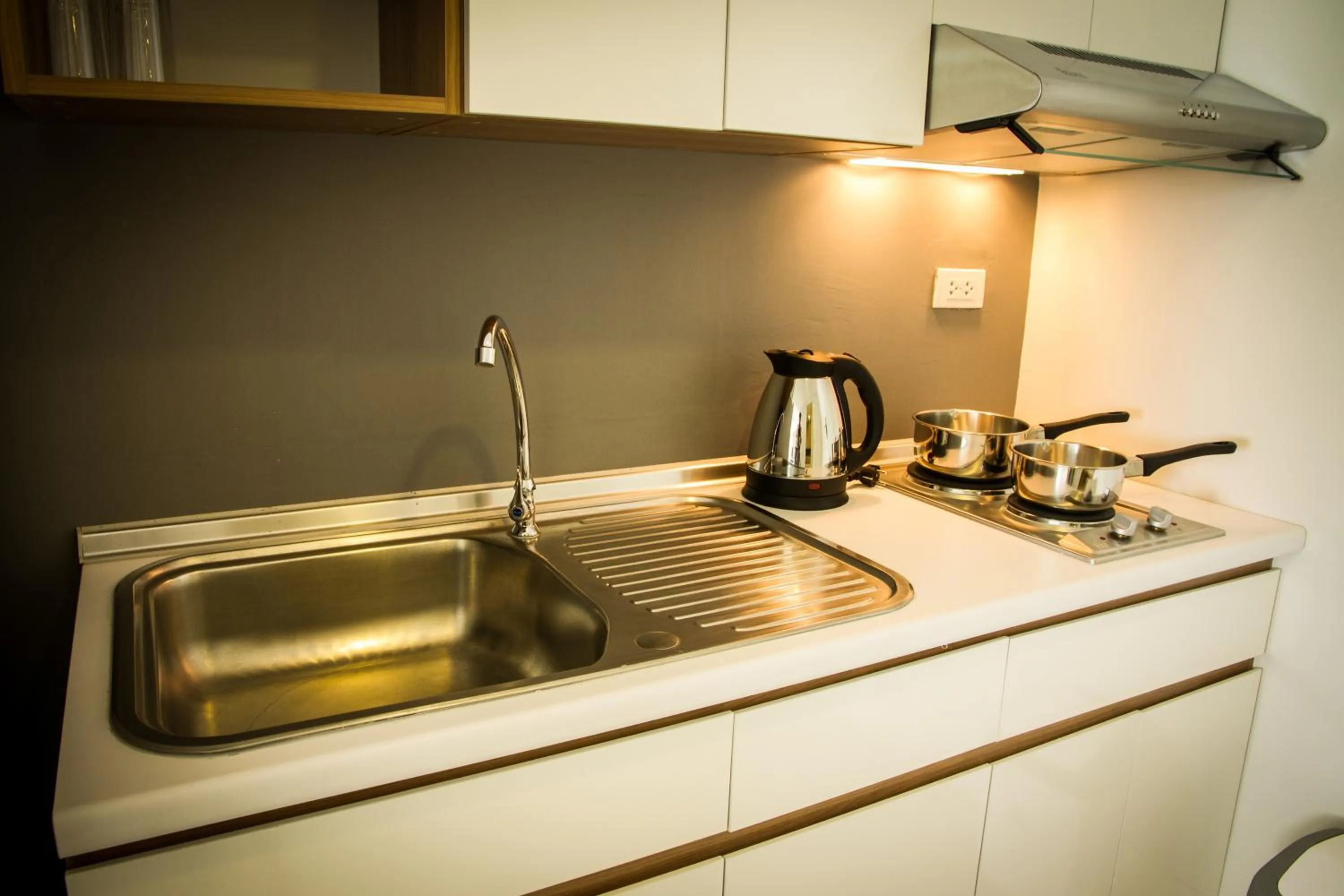 Kitchen or kitchenette in Racha Residence