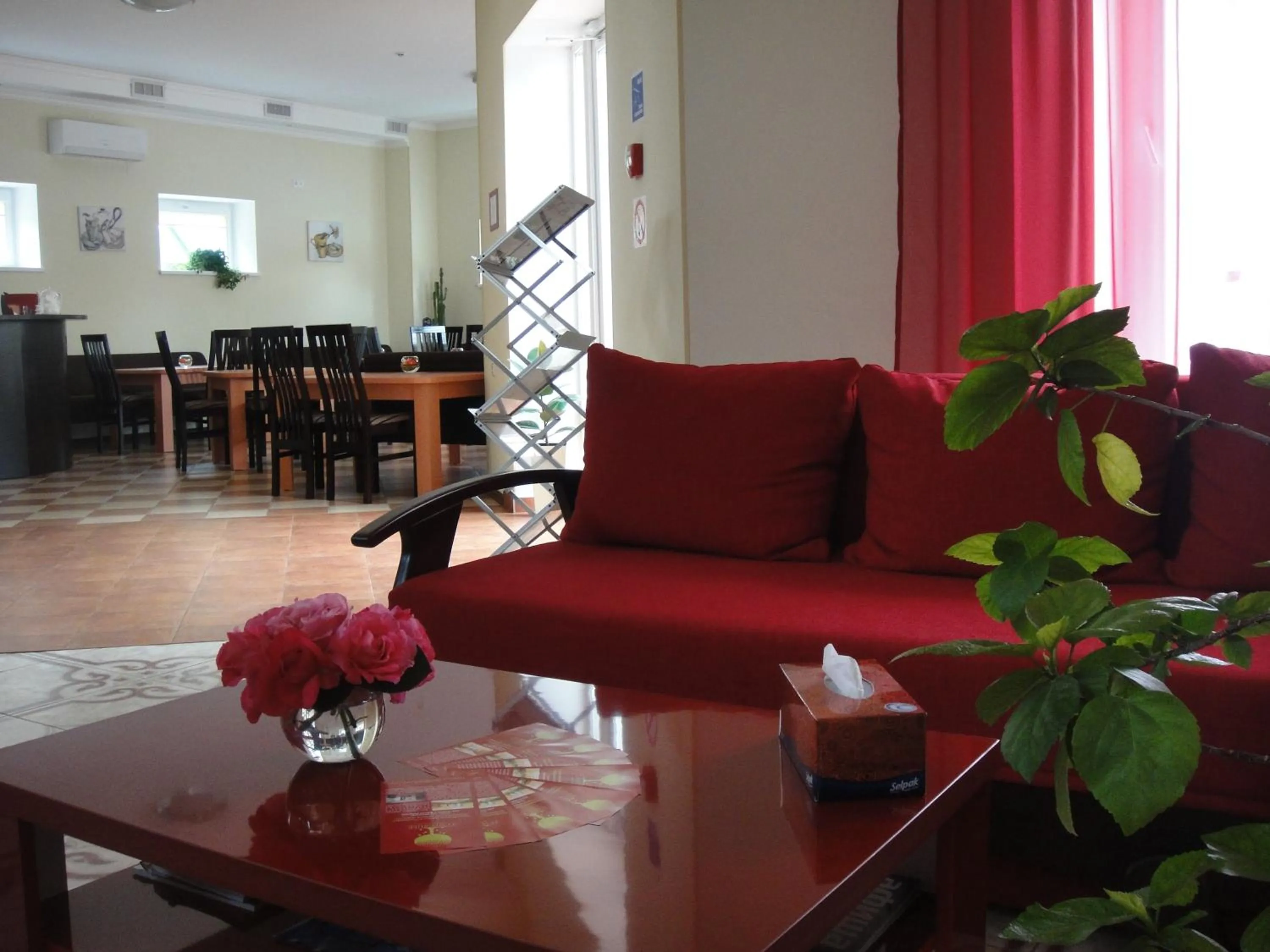 Communal lounge/ TV room in 12 Months Mini Hotel