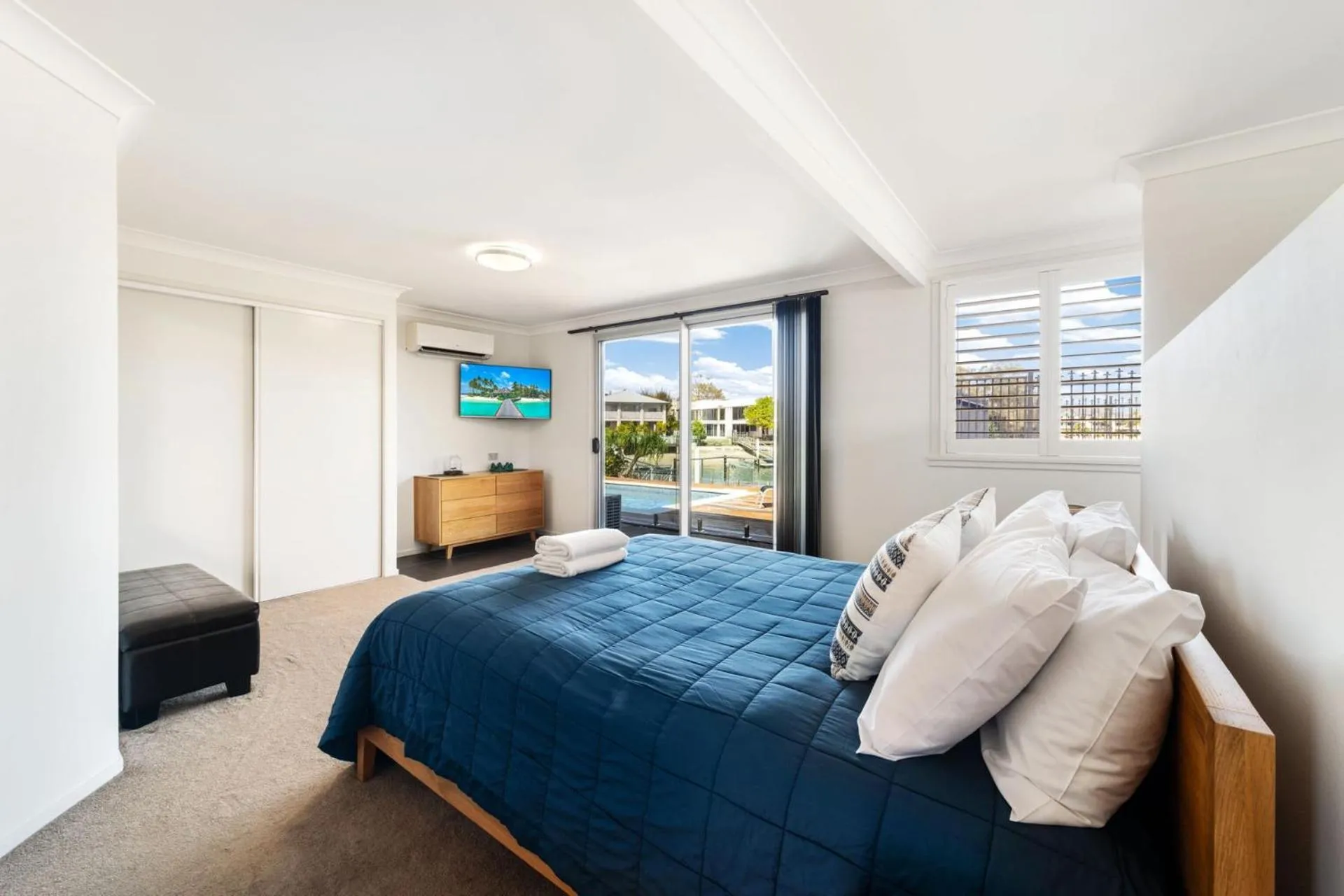 Bed in 4 bedroom home on canal