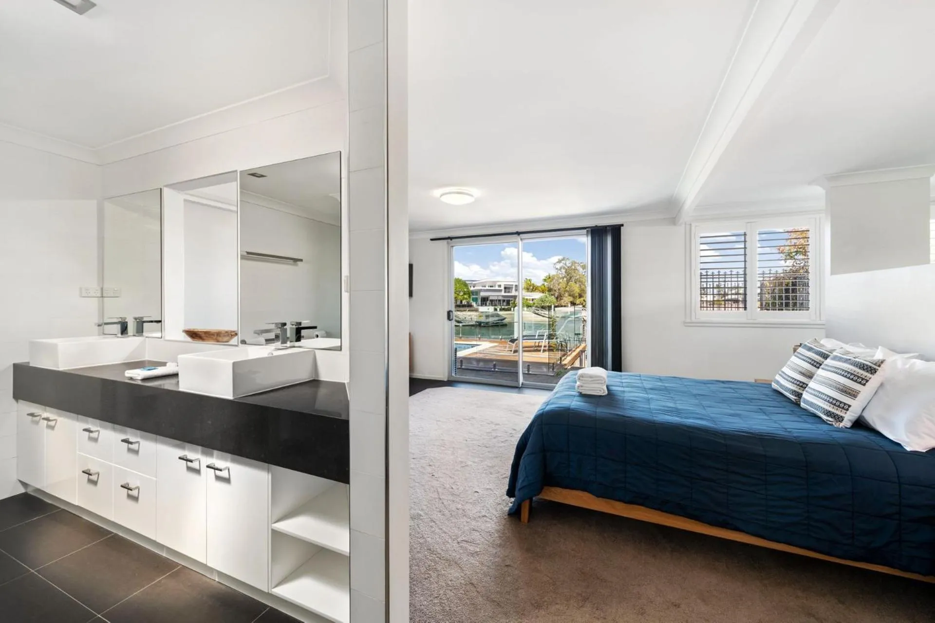Bed in 4 bedroom home on canal