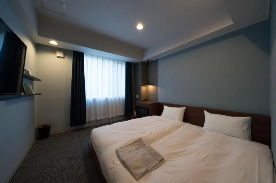 Bed in BOOK HOTEL Kyoto KUJYO