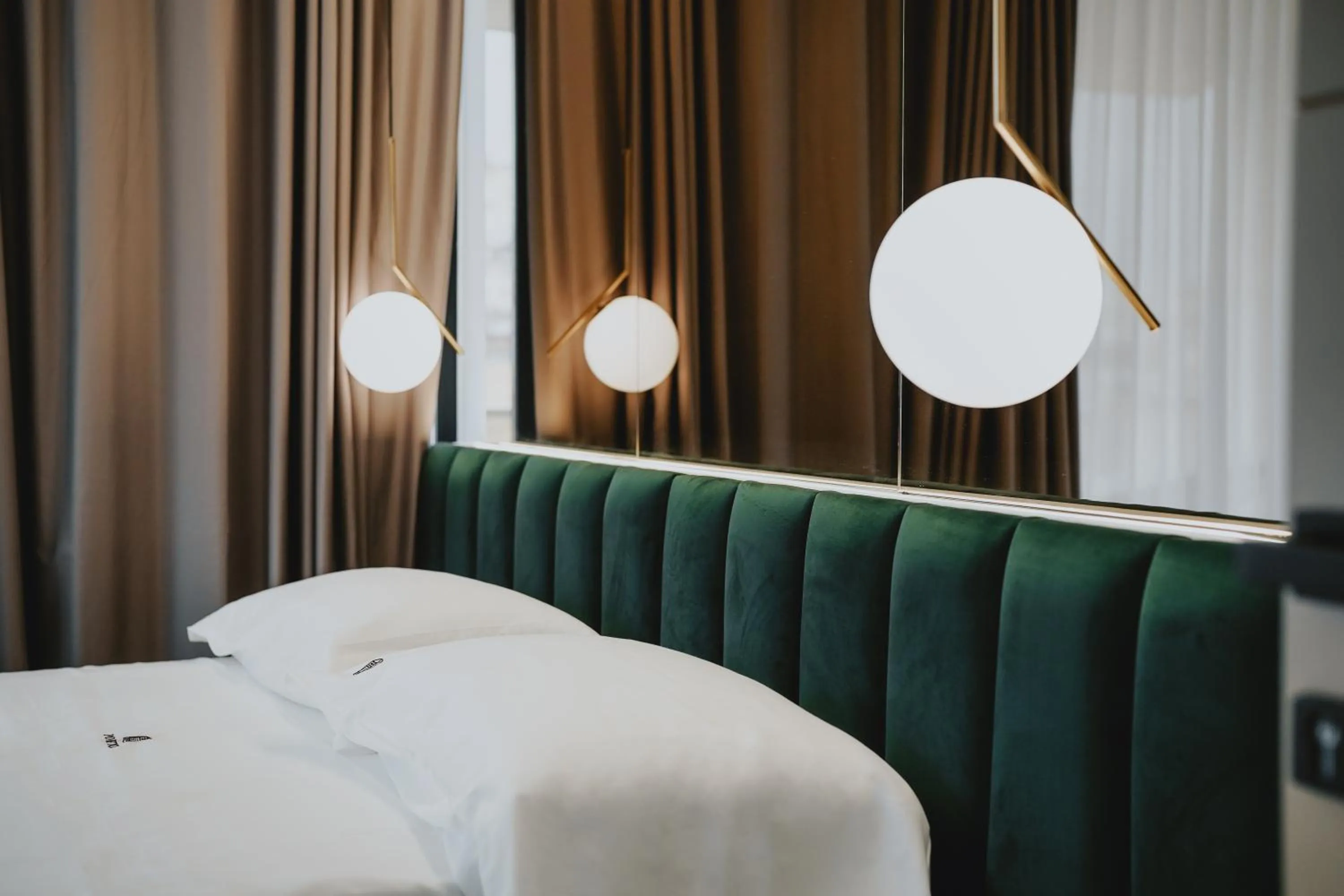 Bed in POETICA BOUTIQUE SKY HOTEL