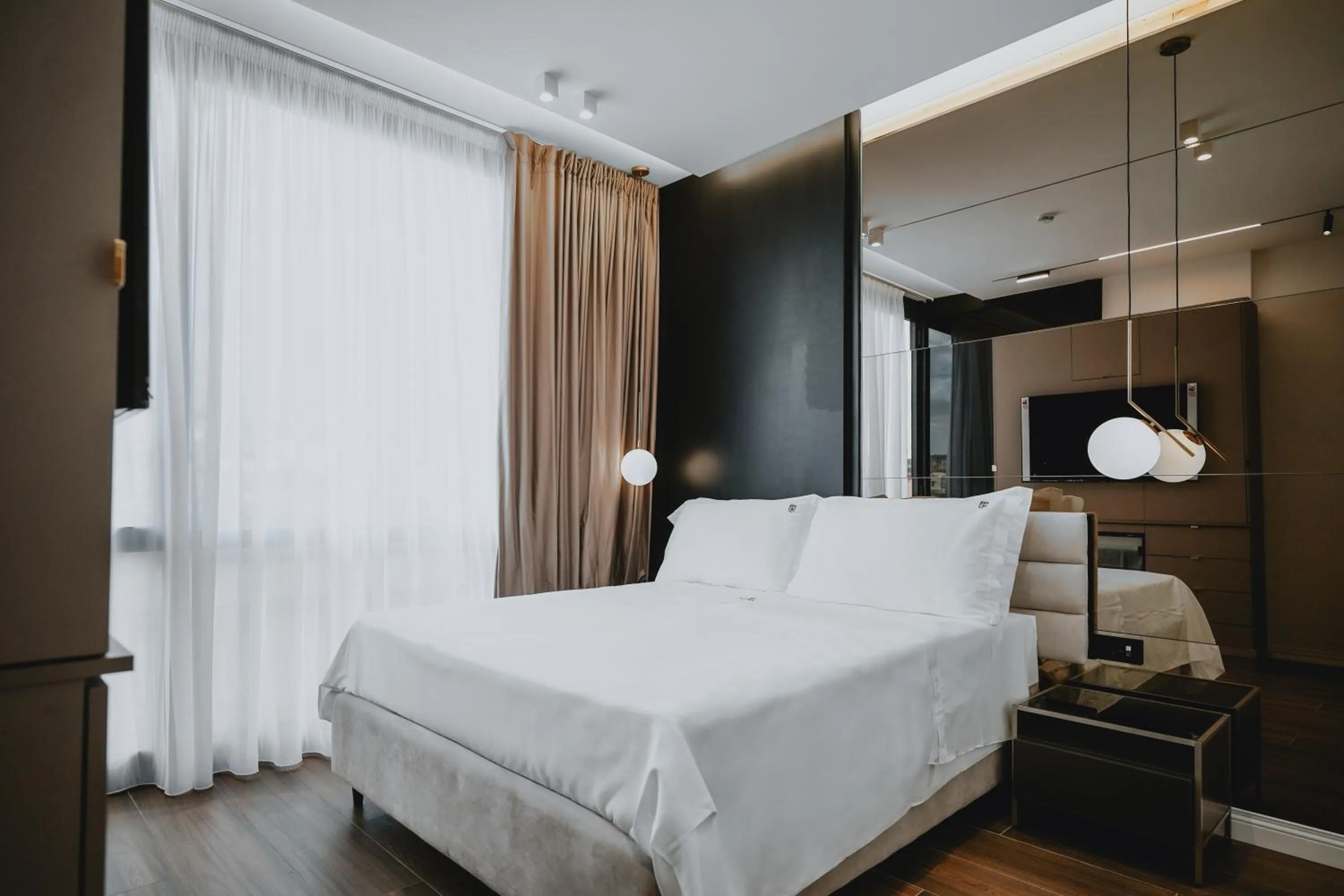 Bed in POETICA BOUTIQUE SKY HOTEL