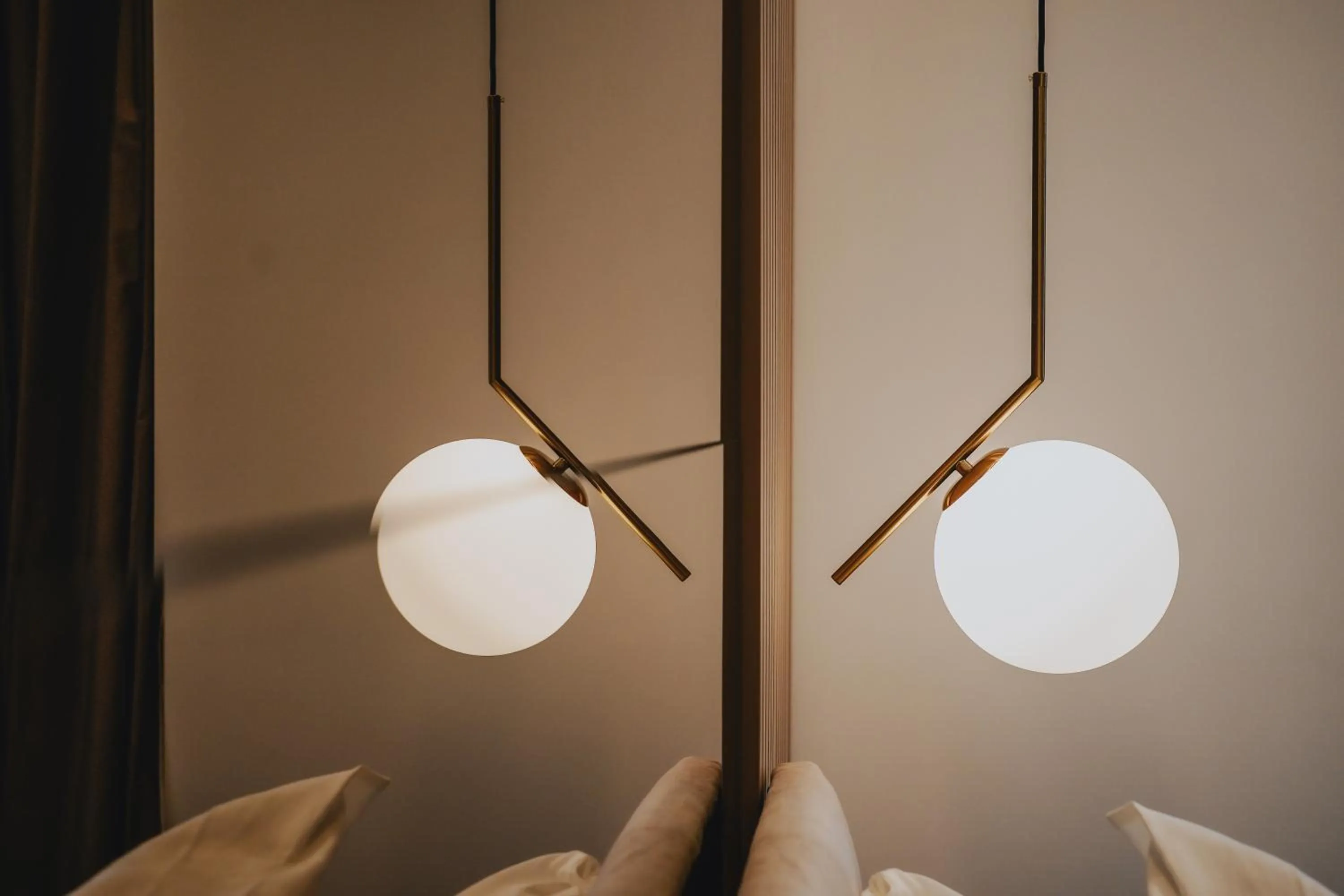 Bed in POETICA BOUTIQUE SKY HOTEL