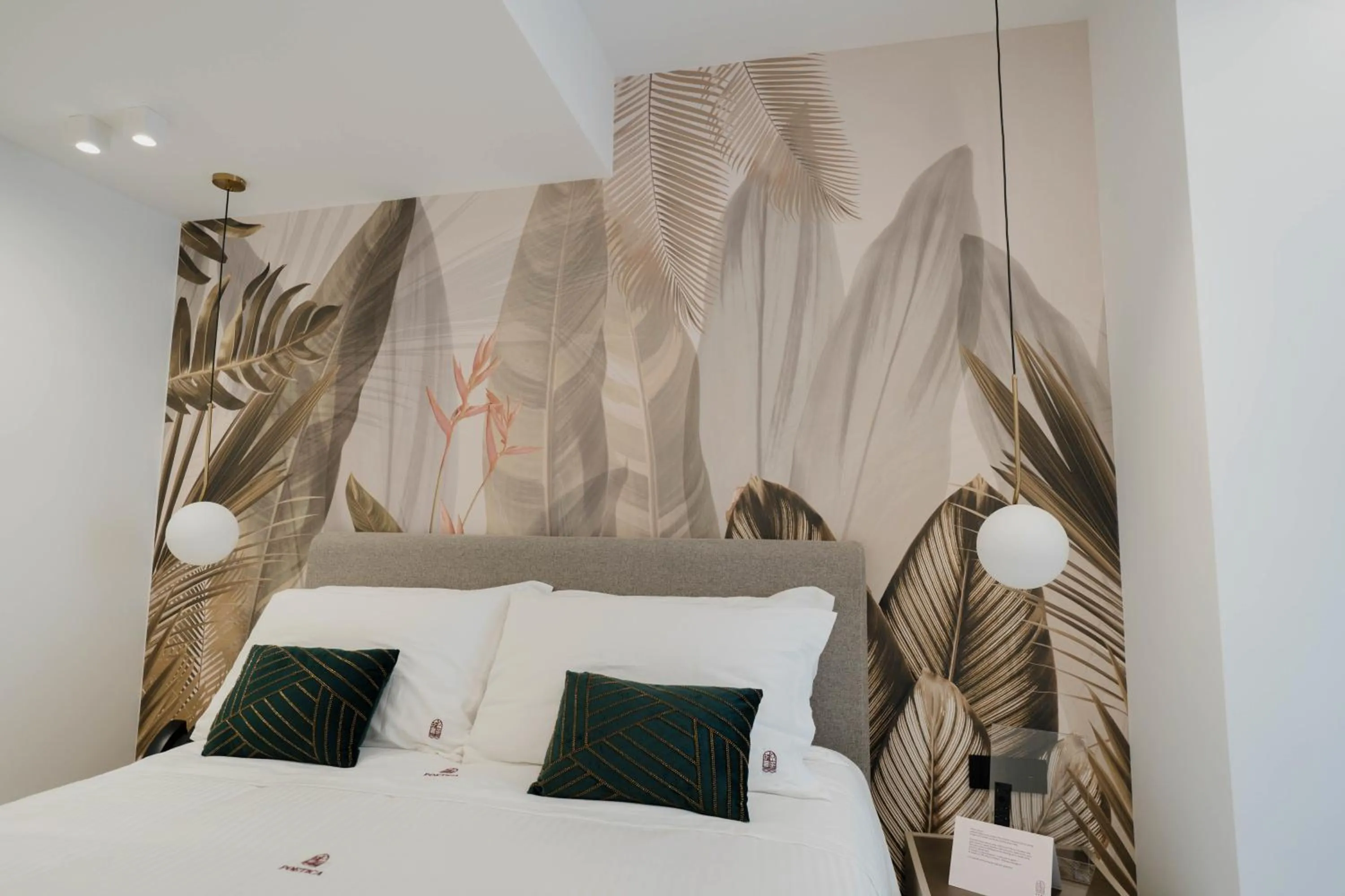 Bed in POETICA BOUTIQUE SKY HOTEL