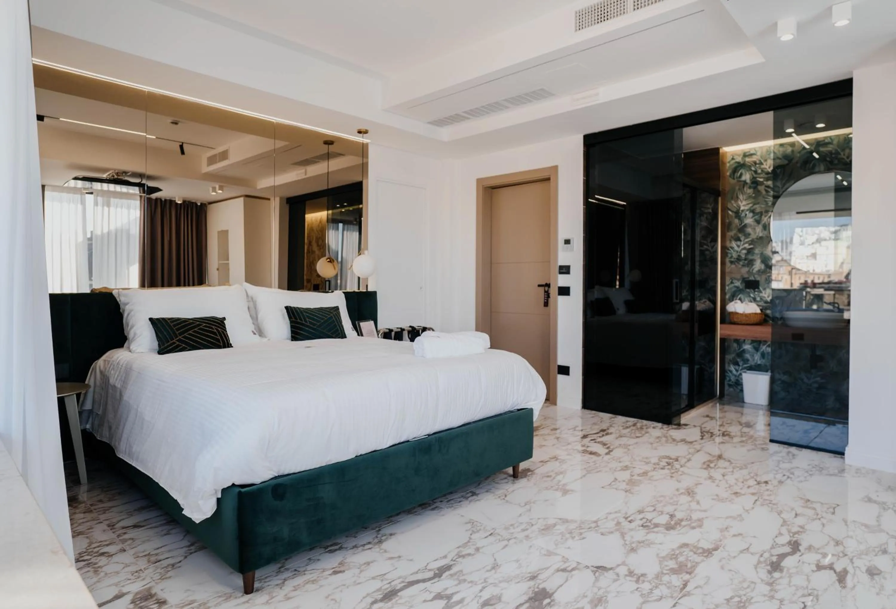 Bed in POETICA BOUTIQUE SKY HOTEL