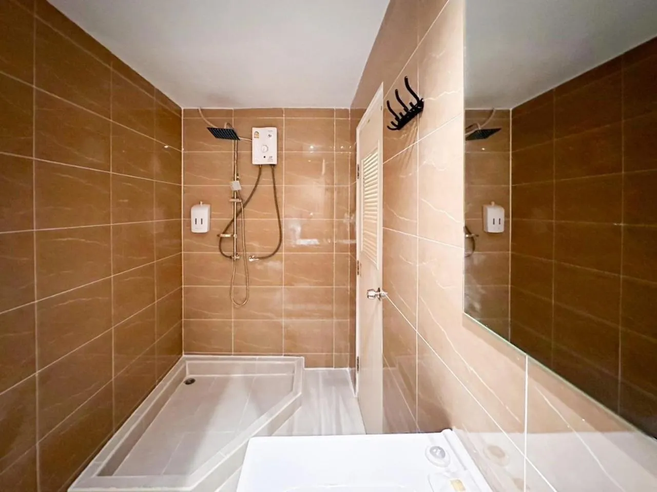 Shower in Thrive Hotel