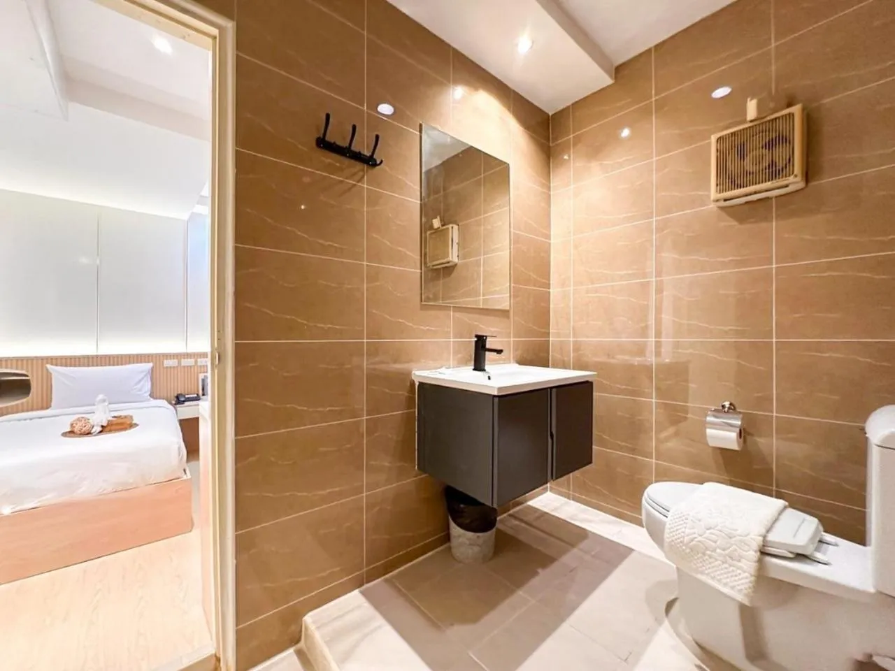 Toilet, Bed in Thrive Hotel