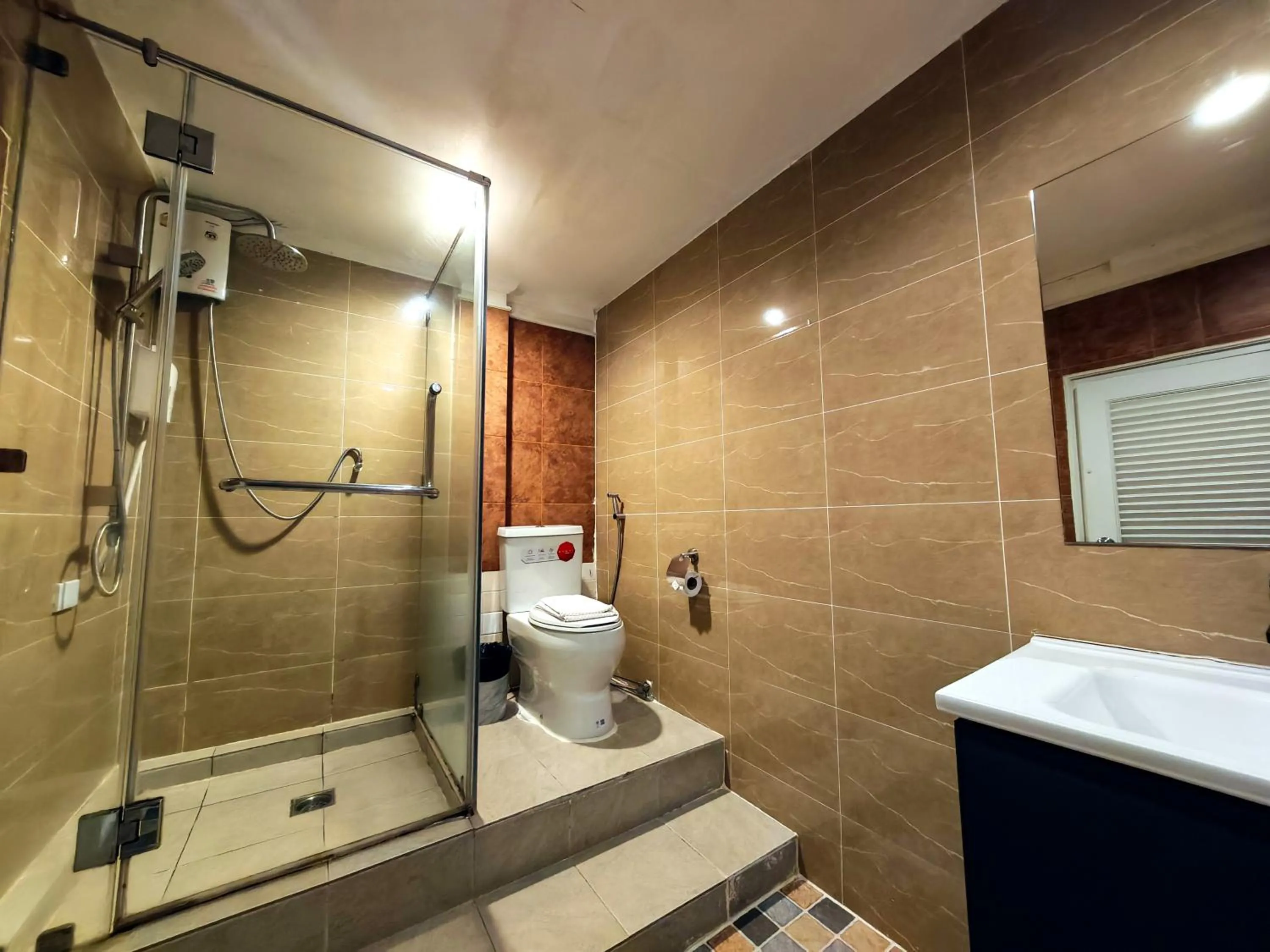 Shower in Thrive Hotel