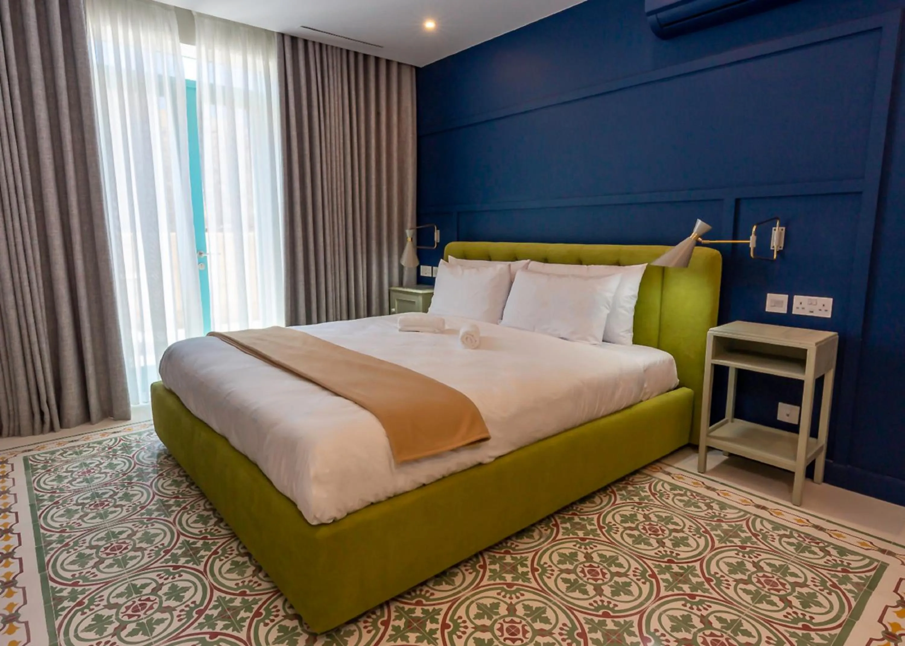 Bedroom in The Vincent Boutique Suites